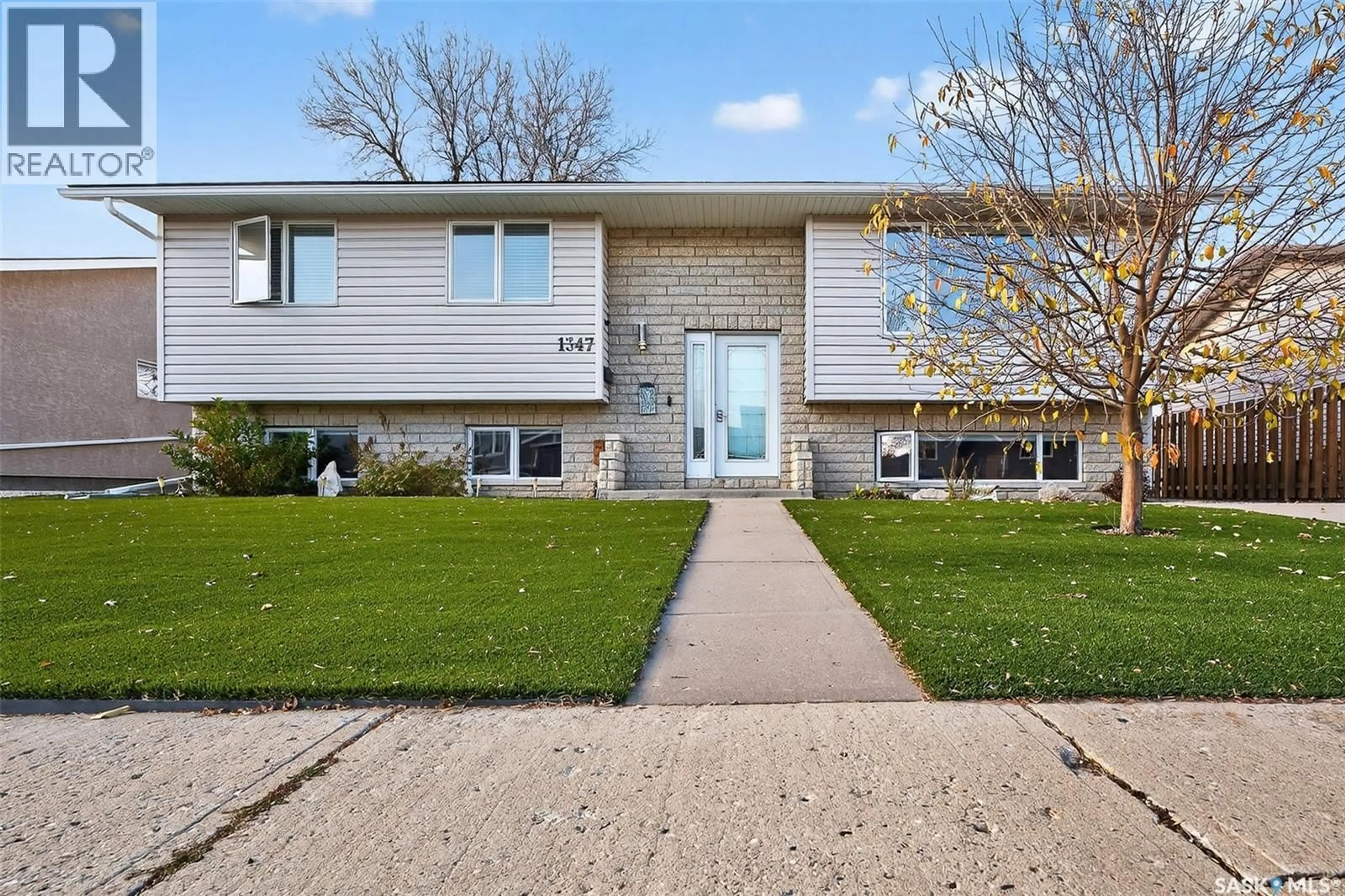 Home with vinyl exterior material, street for 1347 PRINCESS CRESCENT, Moose Jaw Saskatchewan S6H6V7