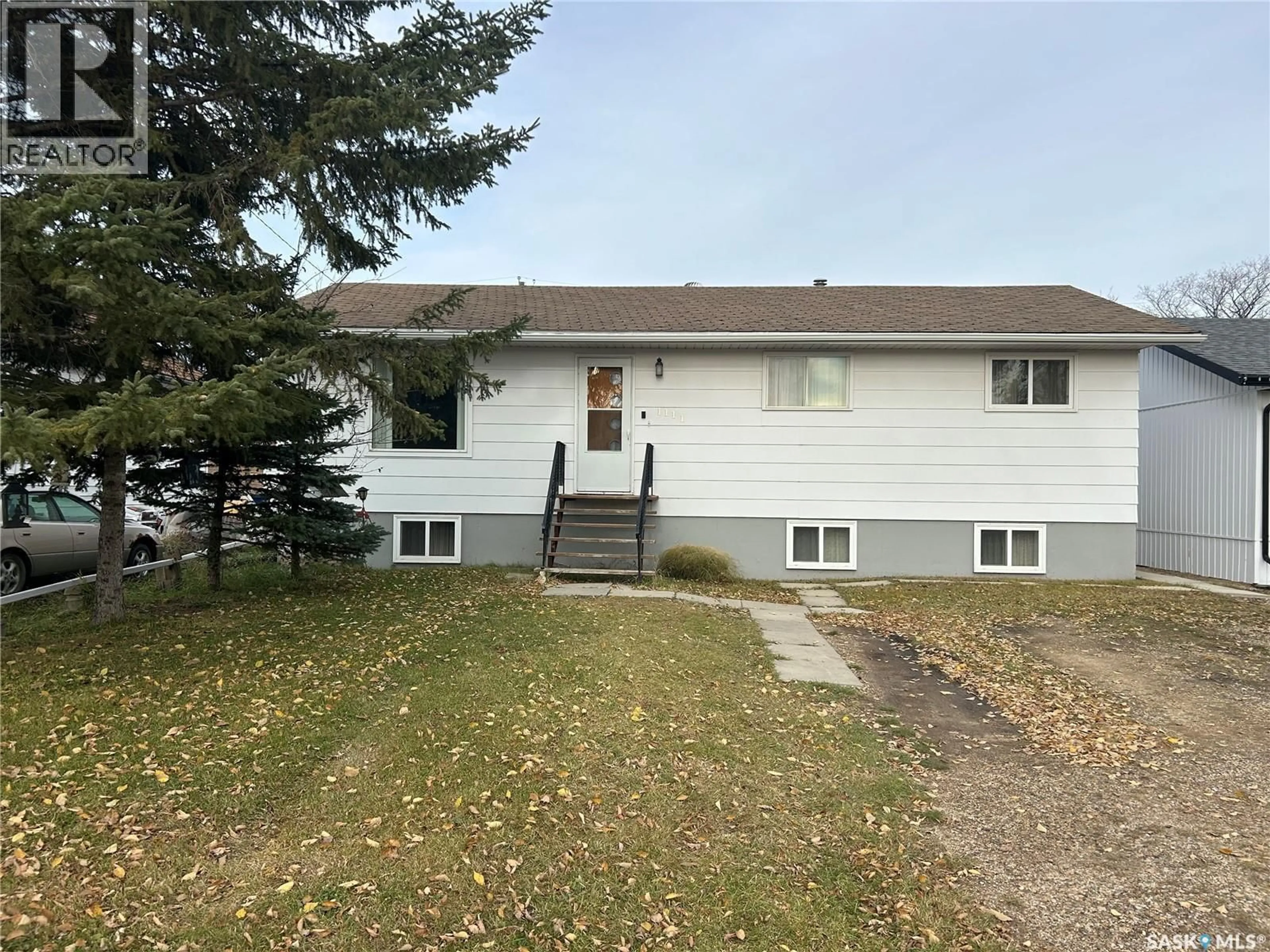 A pic from outside/outdoor area/front of a property/back of a property/a pic from drone, unknown for 1111 100TH AVENUE, Tisdale Saskatchewan S0E1T0
