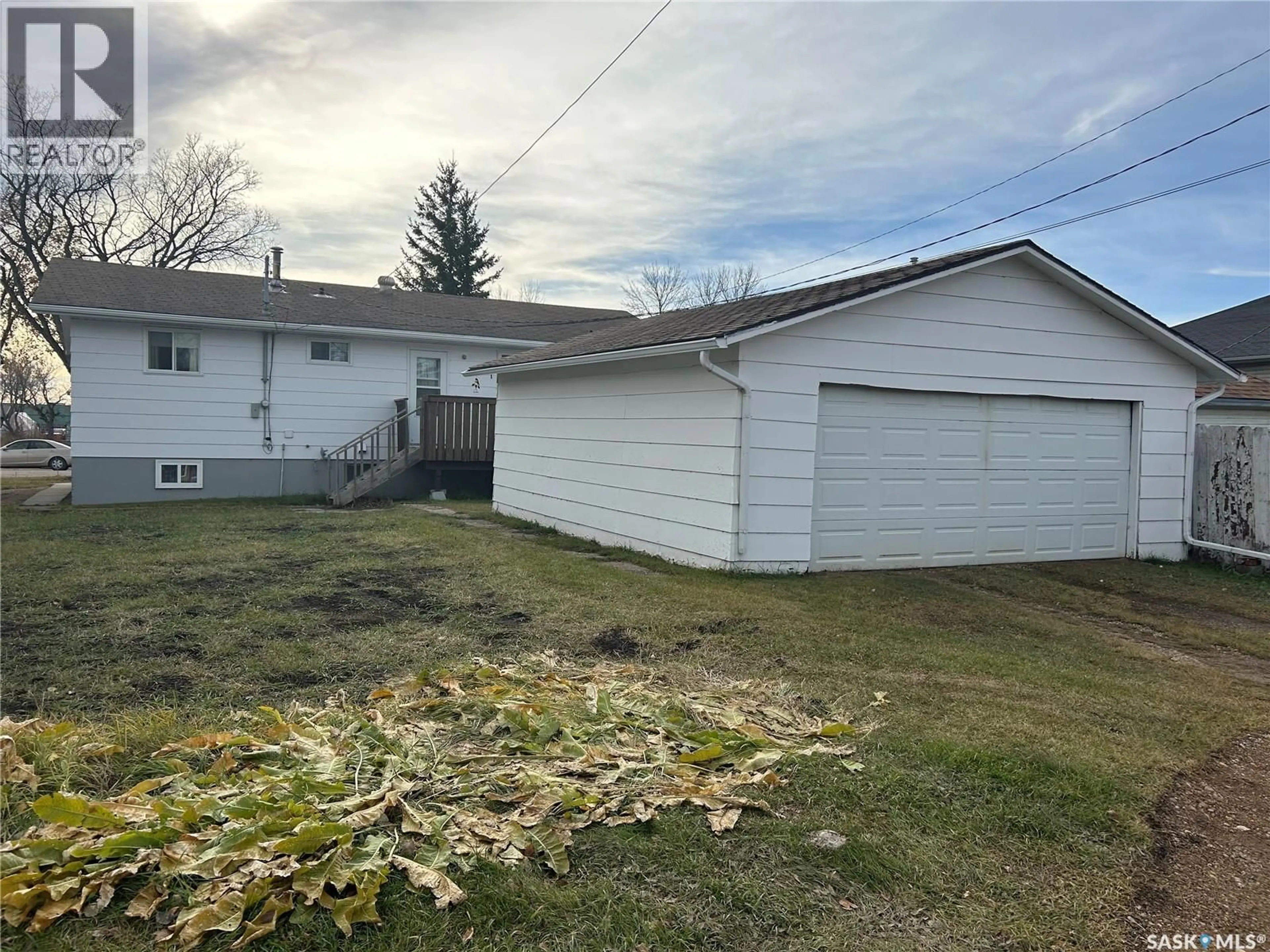 A pic from outside/outdoor area/front of a property/back of a property/a pic from drone, street for 1111 100TH AVENUE, Tisdale Saskatchewan S0E1T0