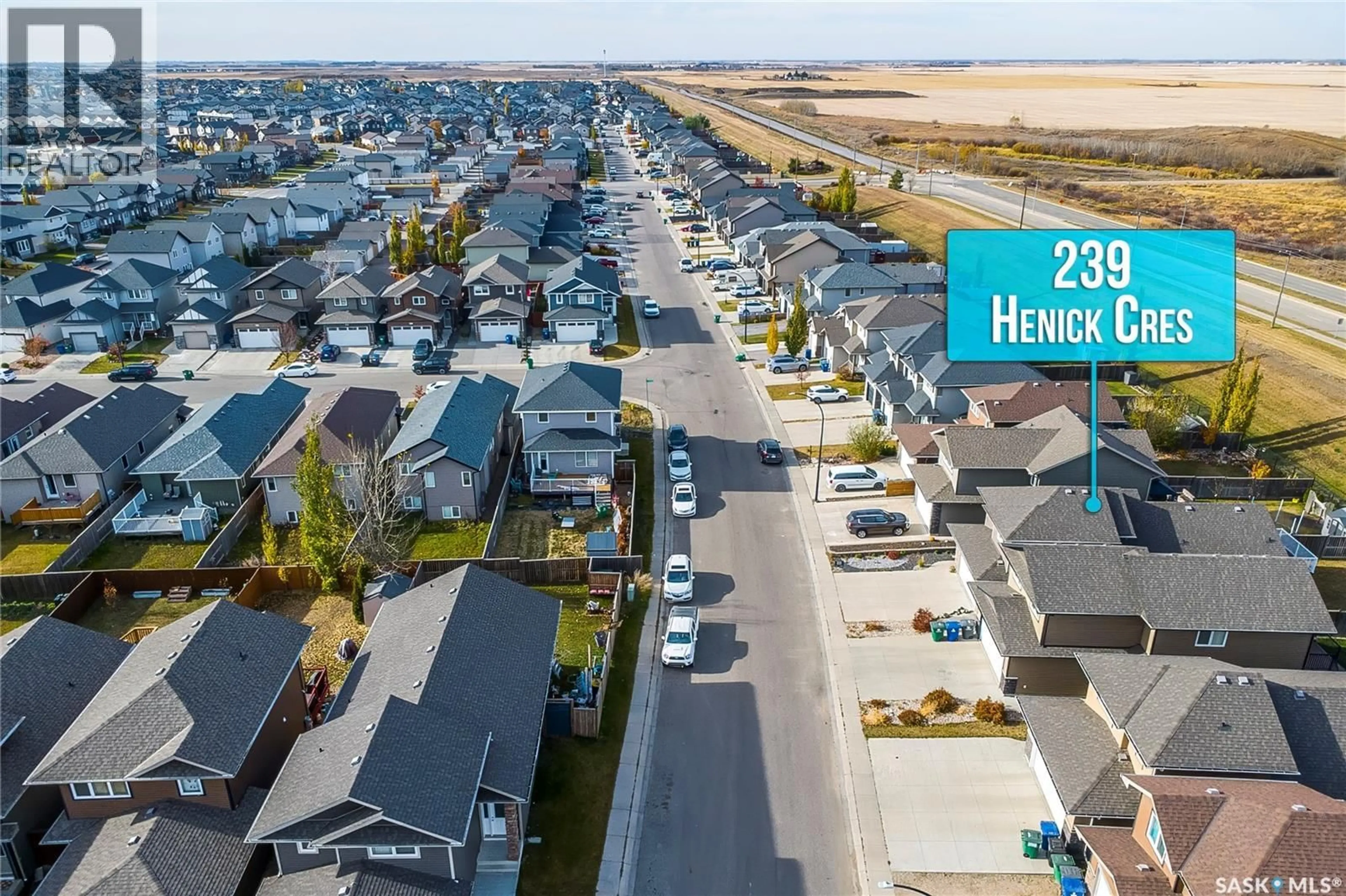 A pic from outside/outdoor area/front of a property/back of a property/a pic from drone, street for 239 HENICK CRESCENT, Saskatoon Saskatchewan S7R0J9