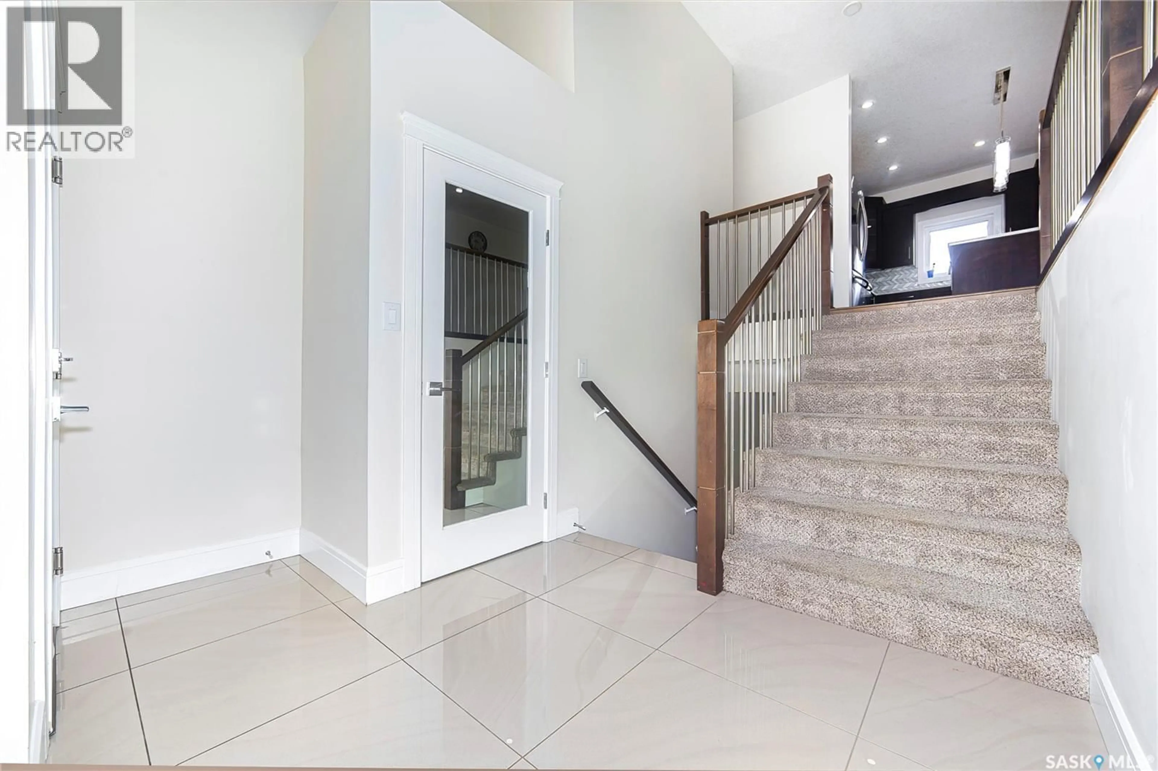 Indoor foyer for 211 SETTLER CRESCENT, Warman Saskatchewan S0K4S2