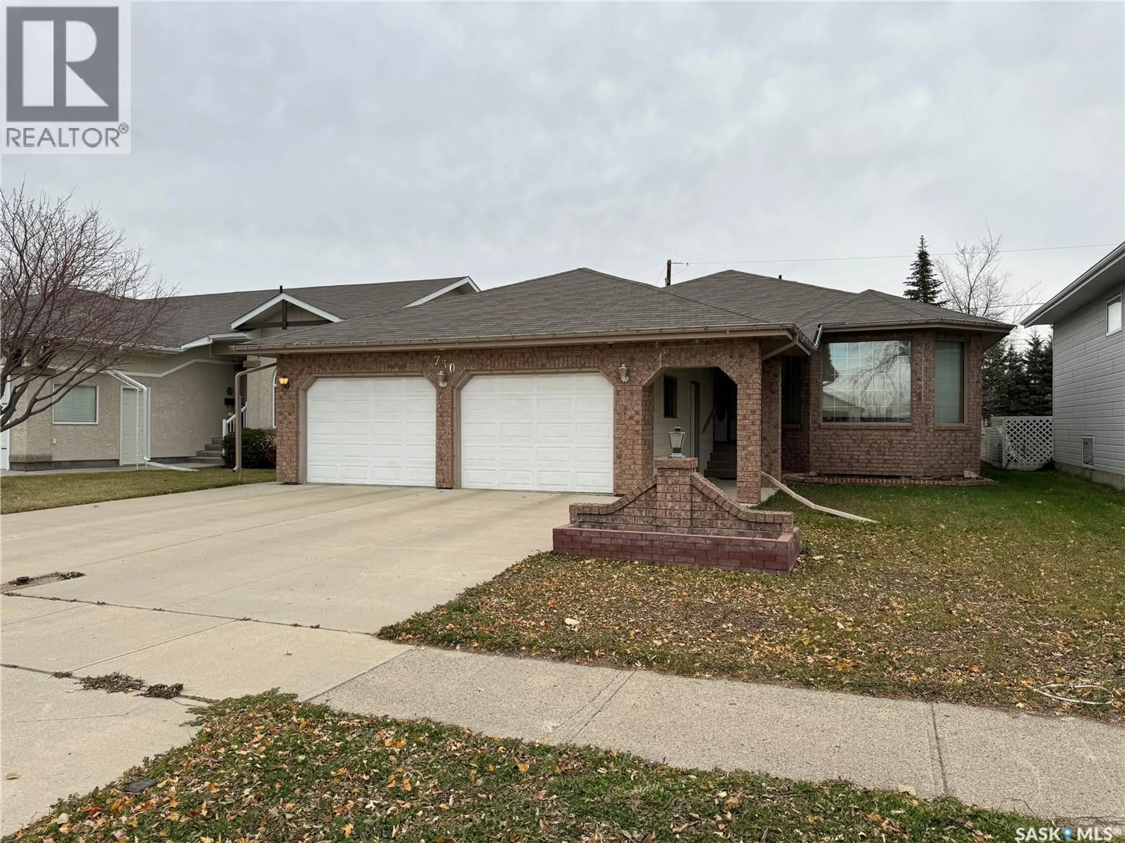 Home with brick exterior material, street for 730 14TH STREET, Humboldt Saskatchewan S0K2A0