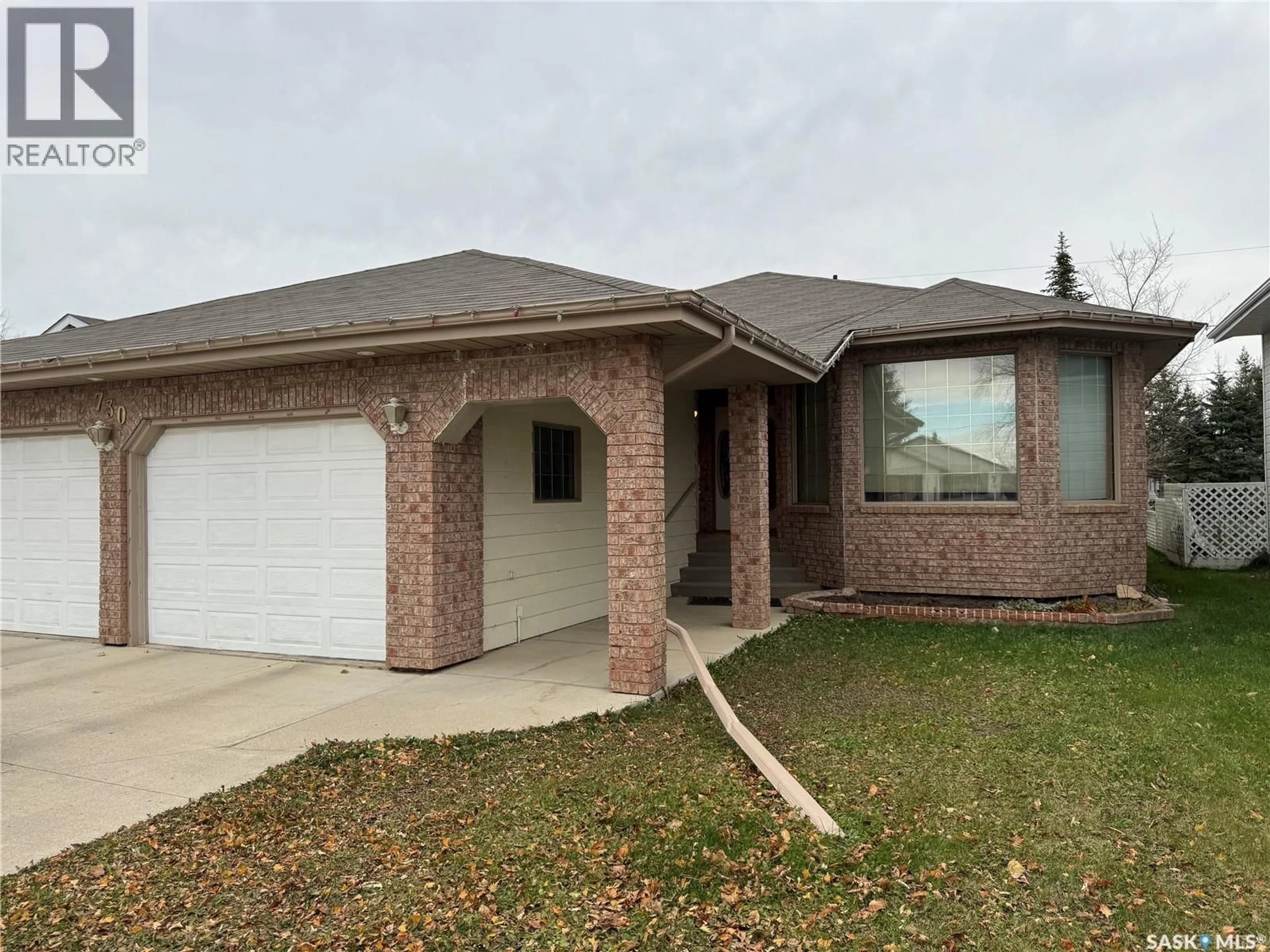 Home with brick exterior material, street for 730 14TH STREET, Humboldt Saskatchewan S0K2A0