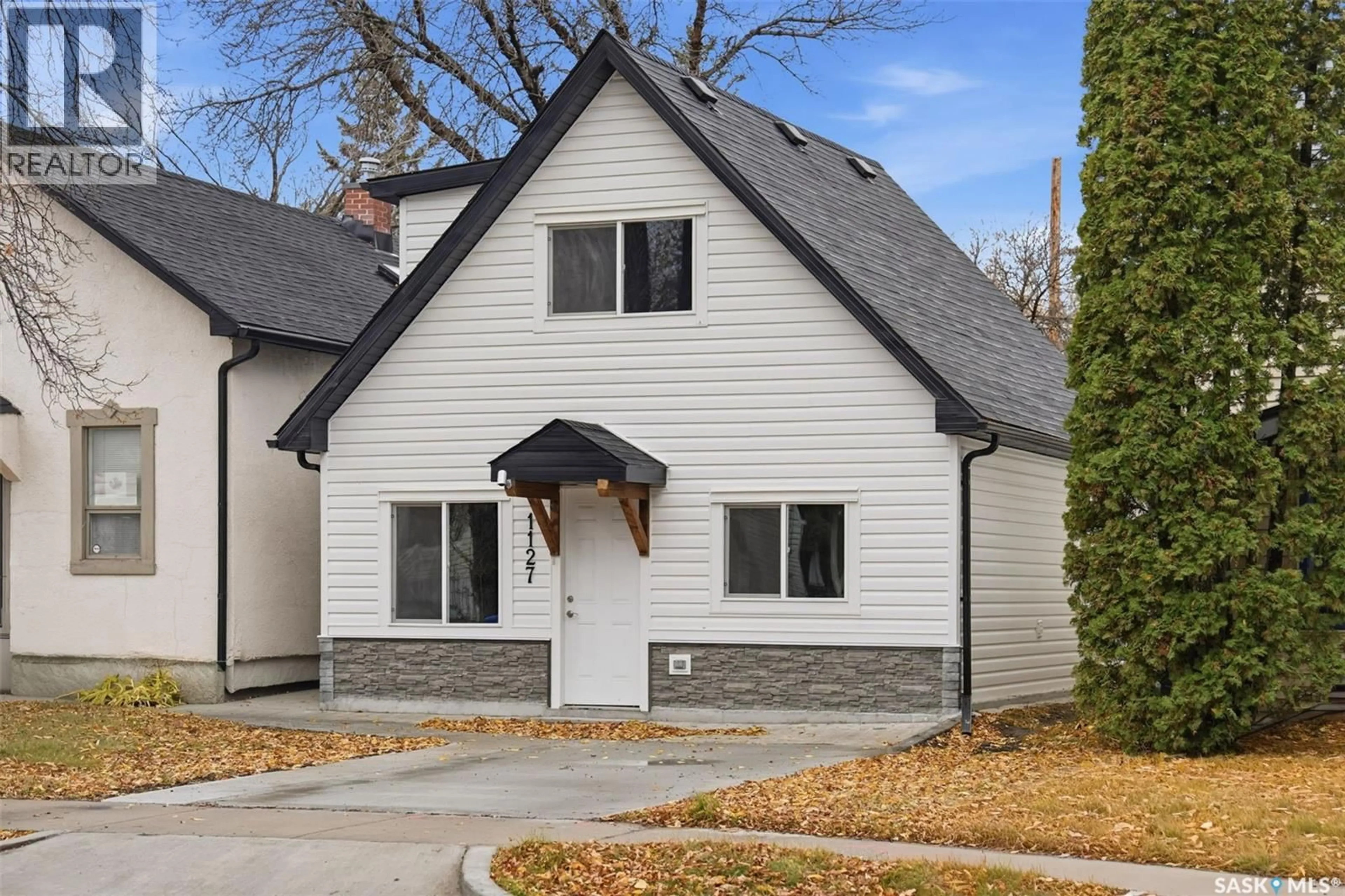 Home with brick exterior material, street for 1127 F AVENUE, Saskatoon Saskatchewan S7L1X1