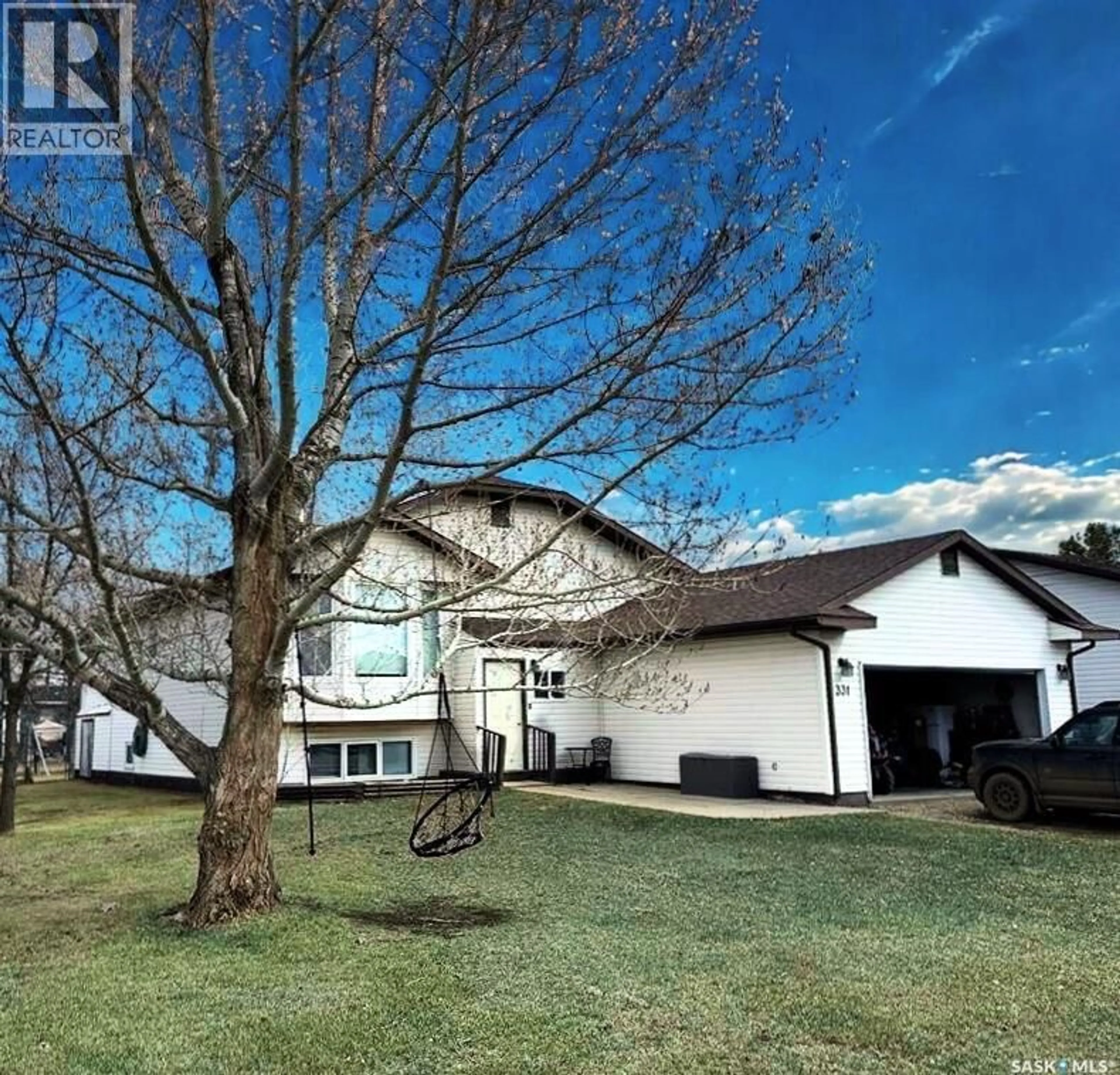 A pic from outside/outdoor area/front of a property/back of a property/a pic from drone, street for 331 4TH STREET, Weyburn Rm No. 67 Saskatchewan S0C1X0