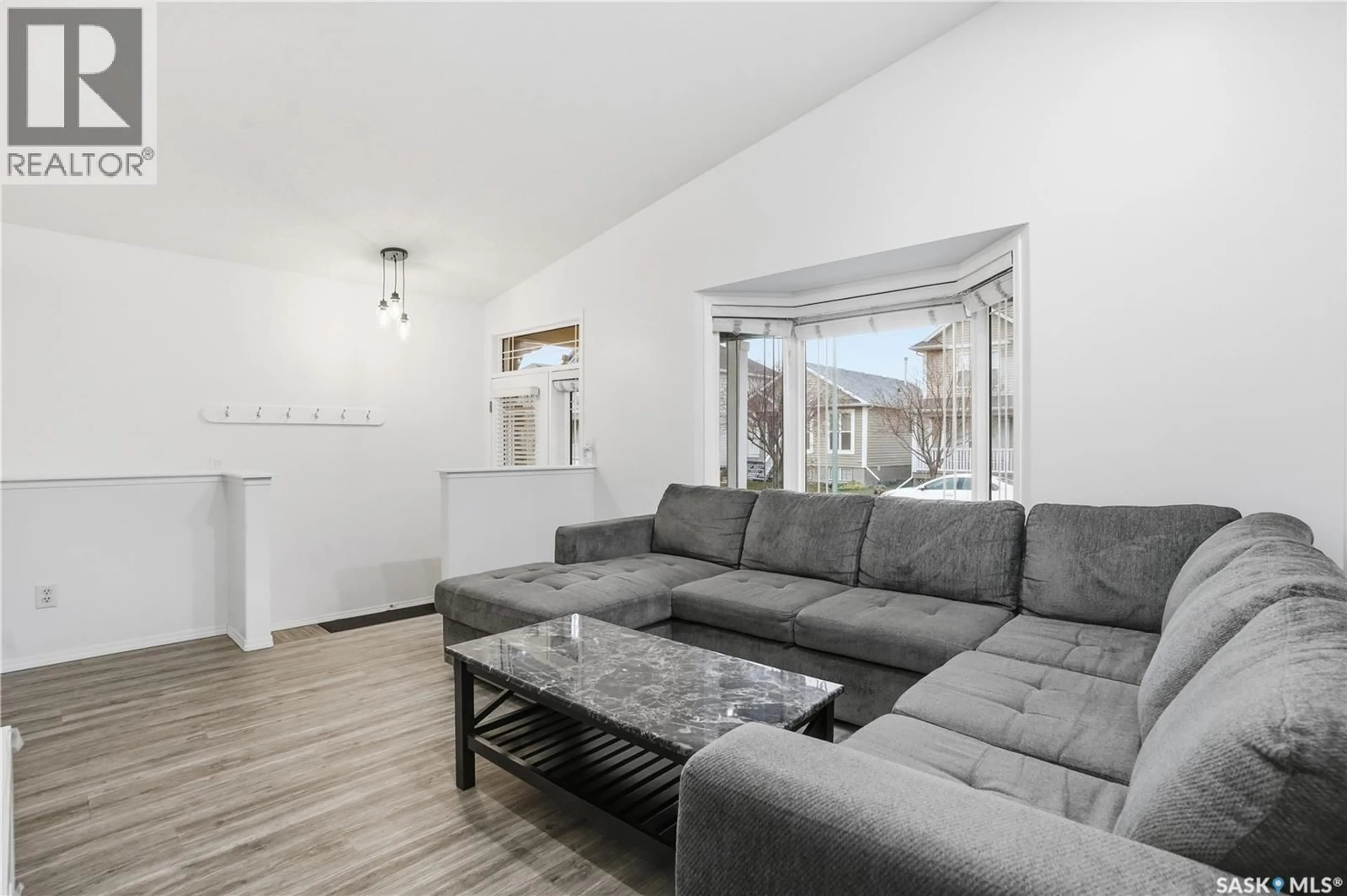 Living room with furniture, unknown for 1024 SNOWBERRY WAY, Regina Saskatchewan S4X4N8