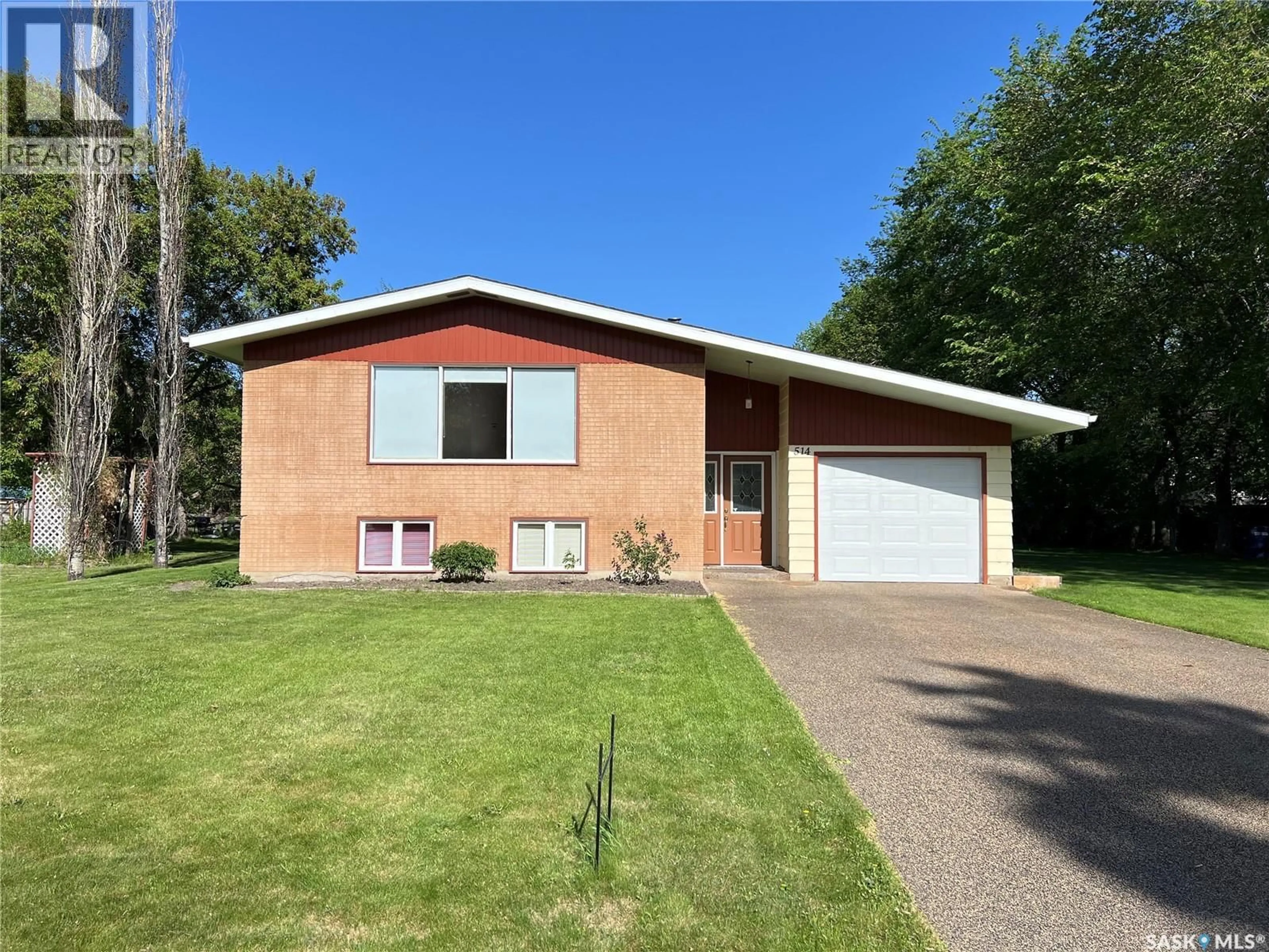 Home with brick exterior material, street for 514 2ND STREET, Meadow Lake Saskatchewan S9X1G6