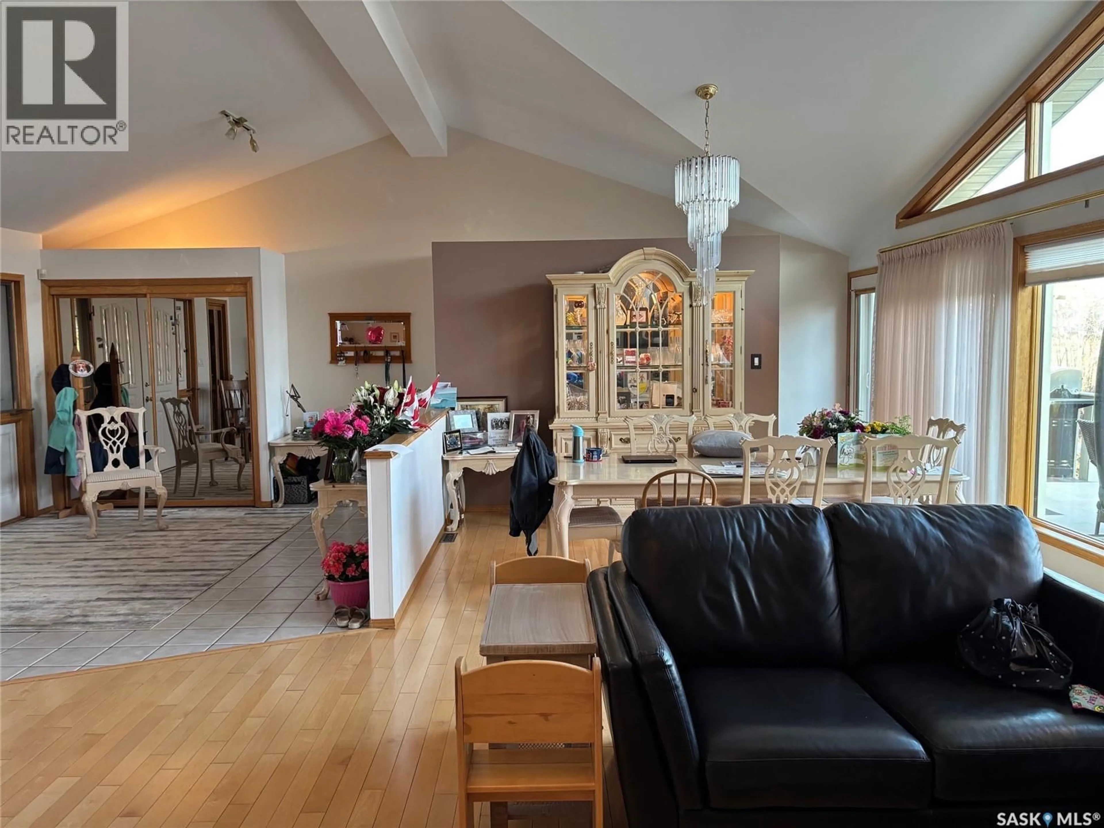 Living room with furniture, wood/laminate floor for 110 LOGAN CRESCENT, Yorkton Saskatchewan S3N0V9