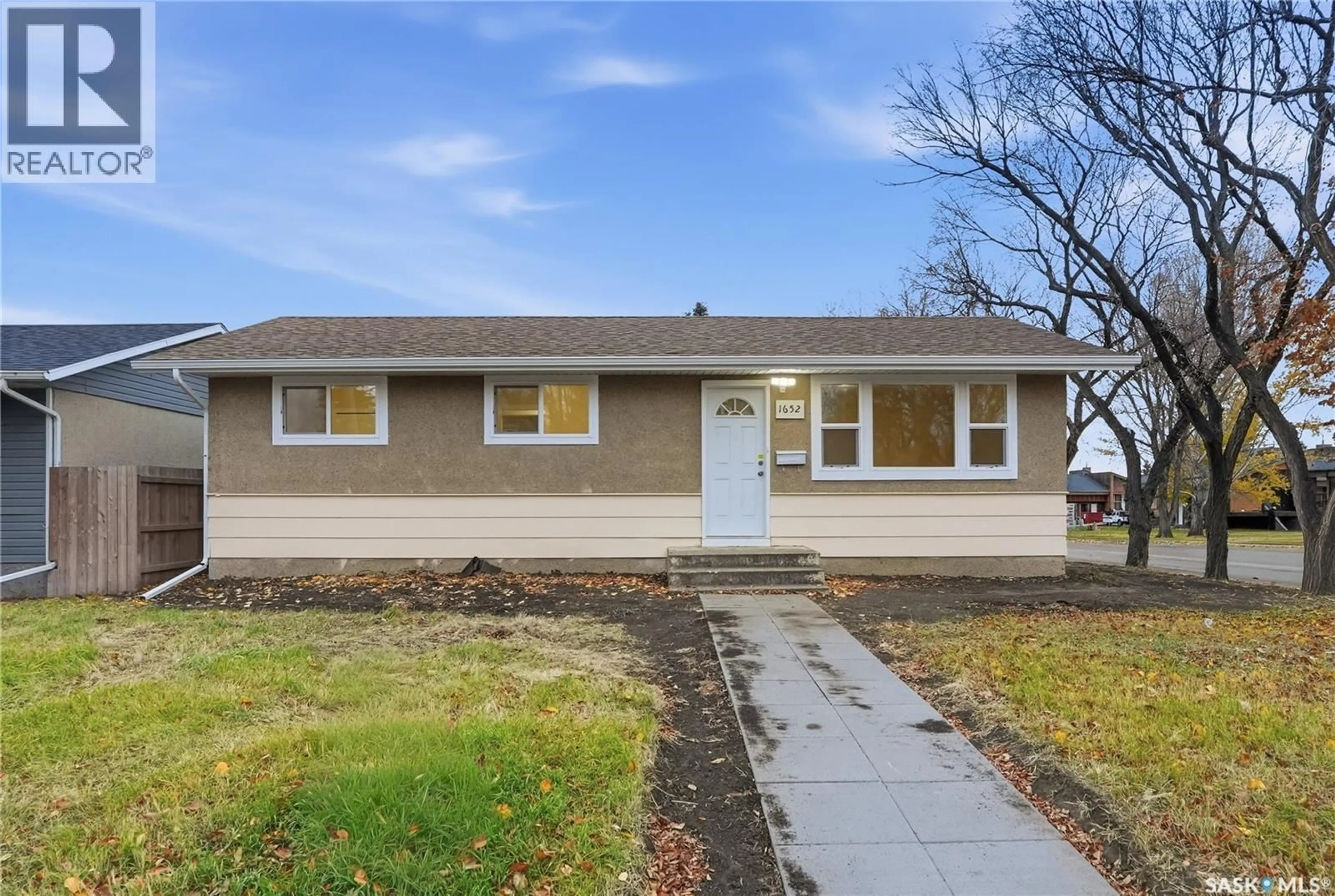 Home with vinyl exterior material, street for 1652 CENTRAL AVENUE, Saskatoon Saskatchewan S7N2H5