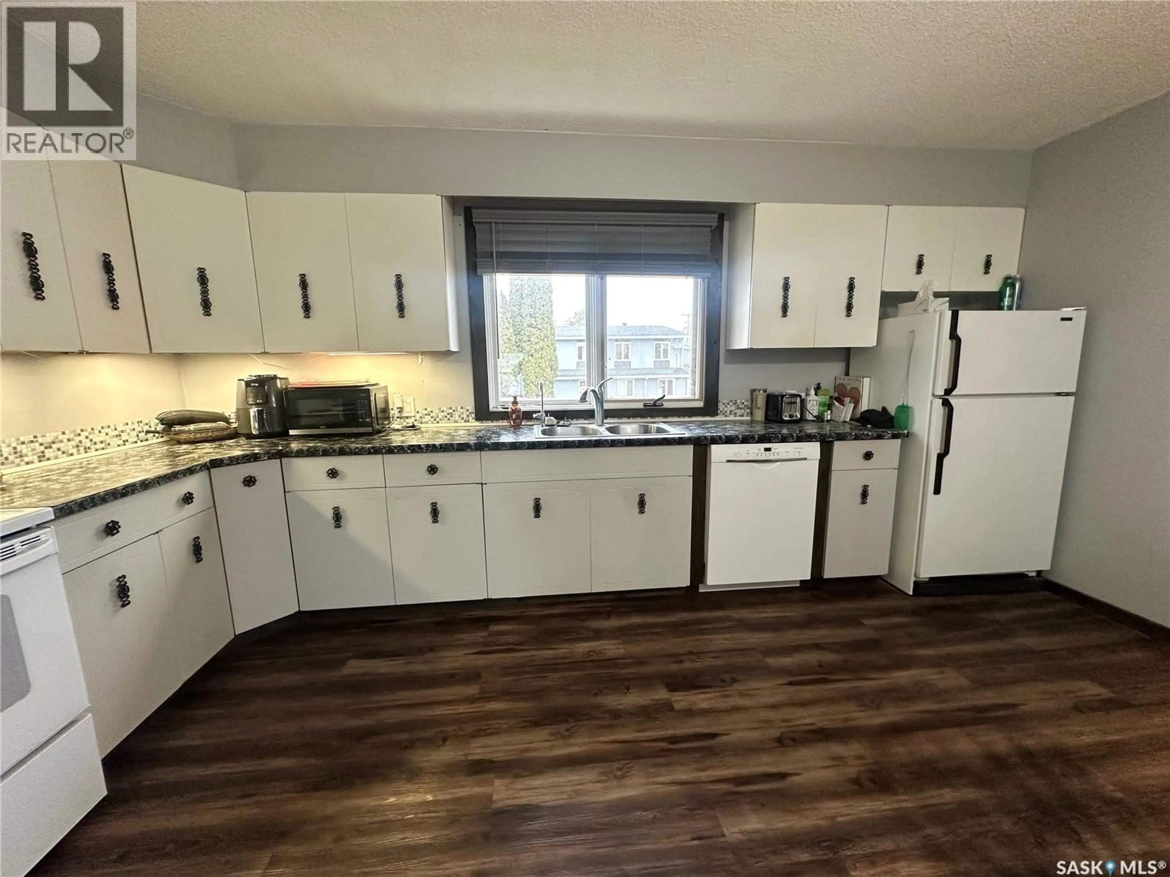 Standard kitchen, wood/laminate floor for 108 PHILLIPS STREET, Turtleford Saskatchewan S0M2Y0