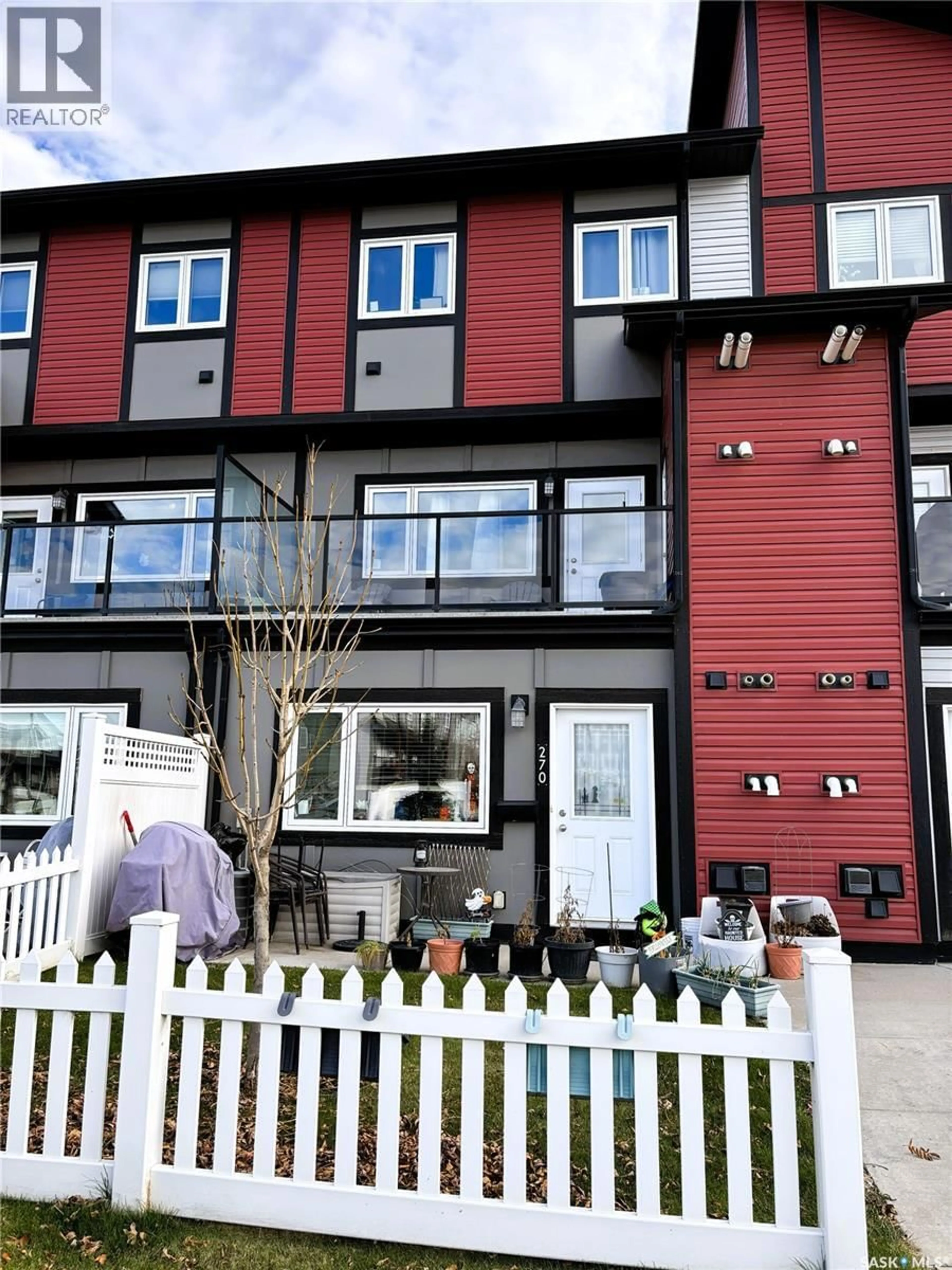 Home with vinyl exterior material, street for 270 250 AKHTAR BEND, Saskatoon Saskatchewan S7W0W4