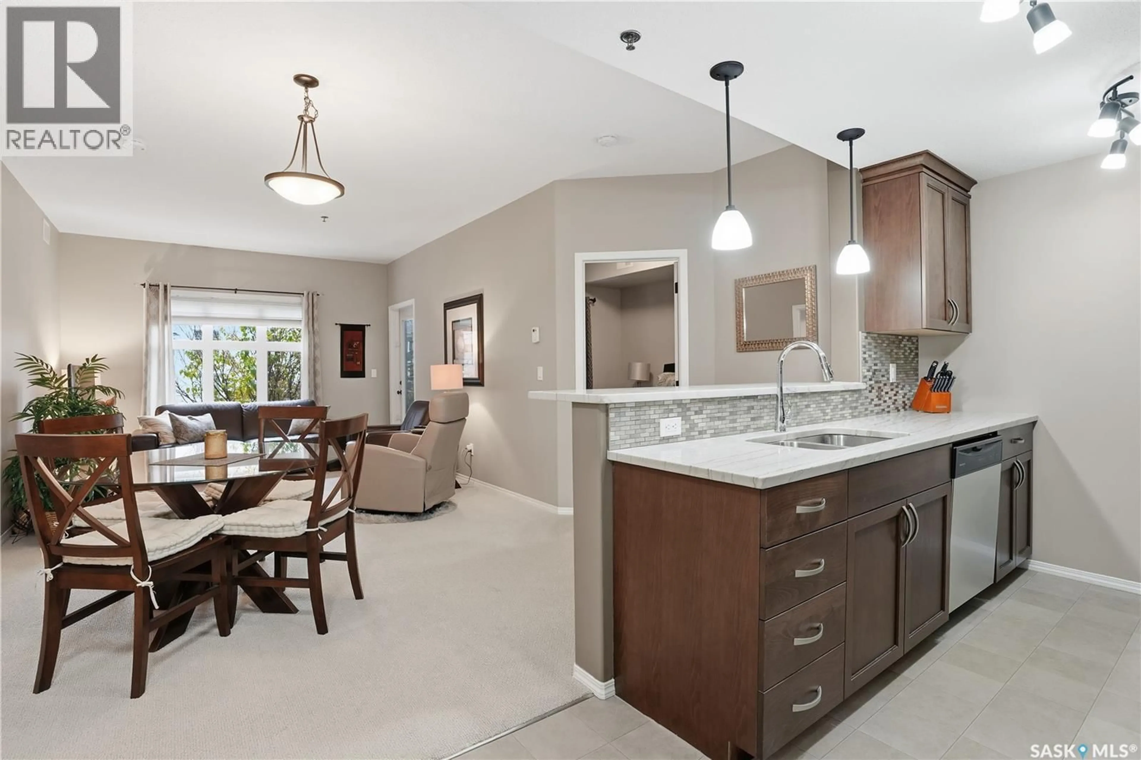 Open concept kitchen, ceramic/tile floor for 103 - 1220 BLACKFOOT DRIVE, Regina Saskatchewan S4S6T2
