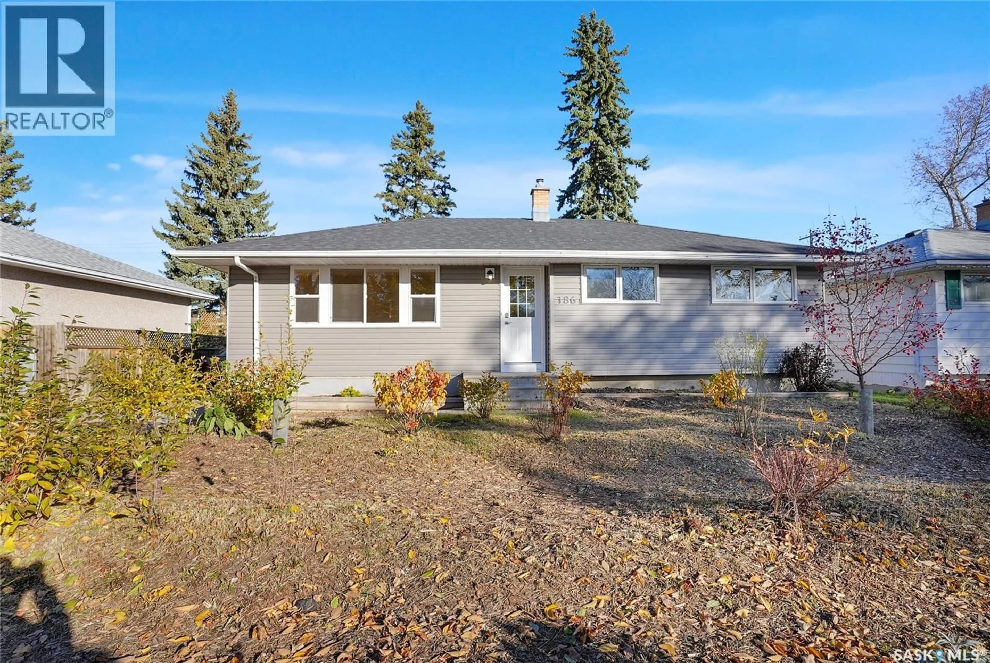 Home with vinyl exterior material, street for 186 COLDWELL ROAD, Regina Saskatchewan S4R4K8