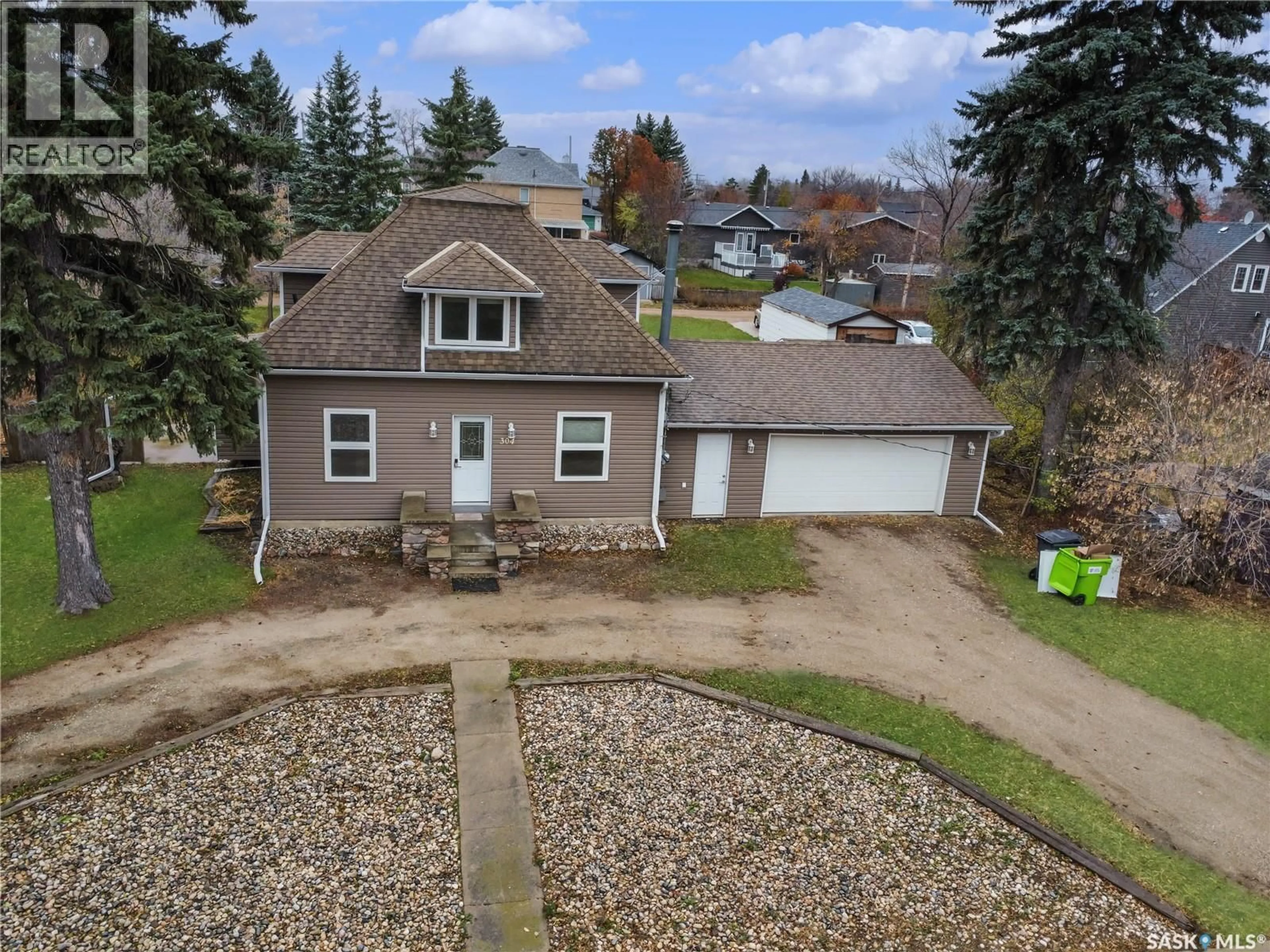A pic from outside/outdoor area/front of a property/back of a property/a pic from drone, street for 304 EBERTS STREET, Indian Head Saskatchewan S0G2K0