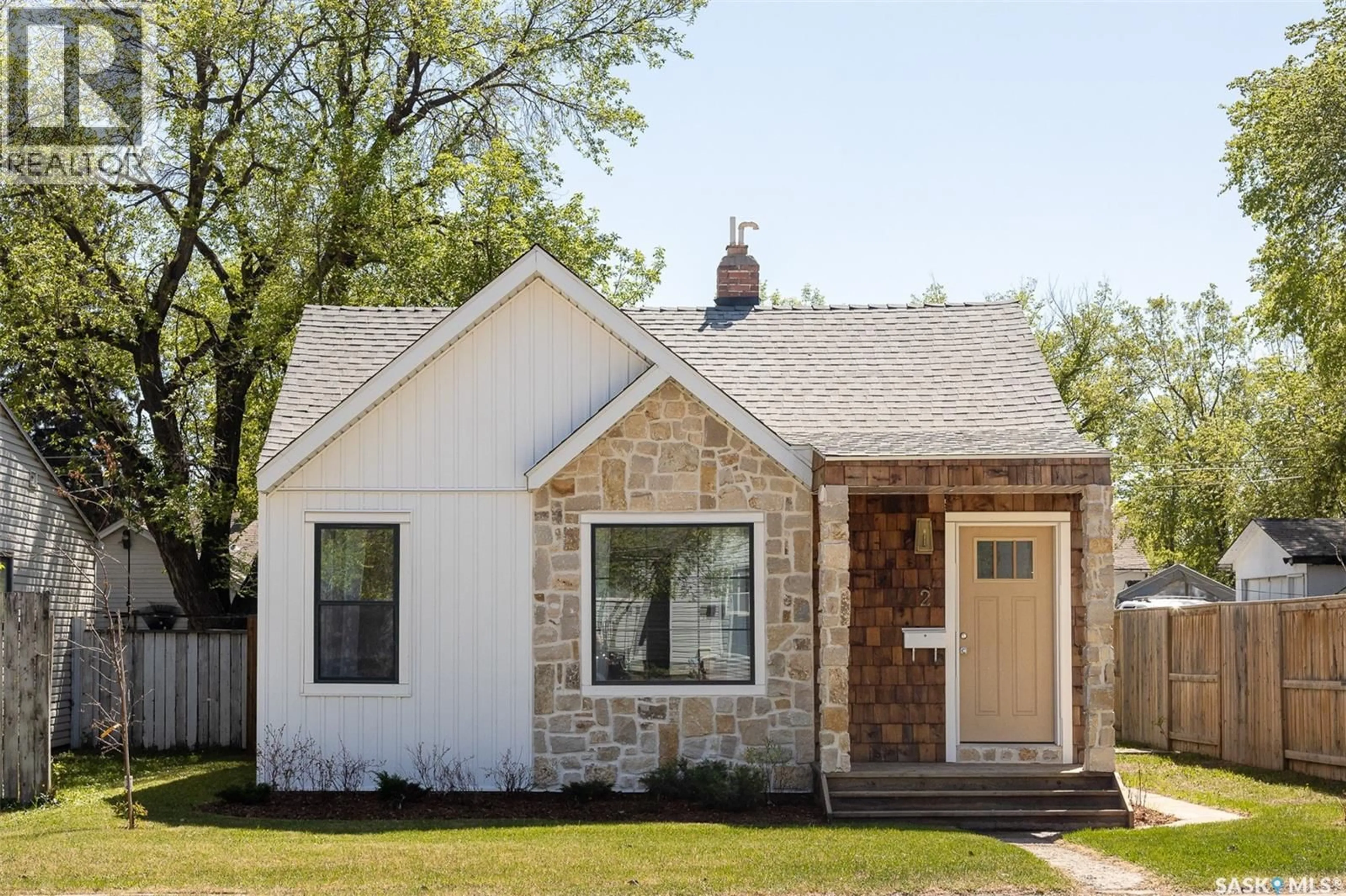 Home with brick exterior material, street for 2 CONNAUGHT PLACE, Saskatoon Saskatchewan S7L1C7