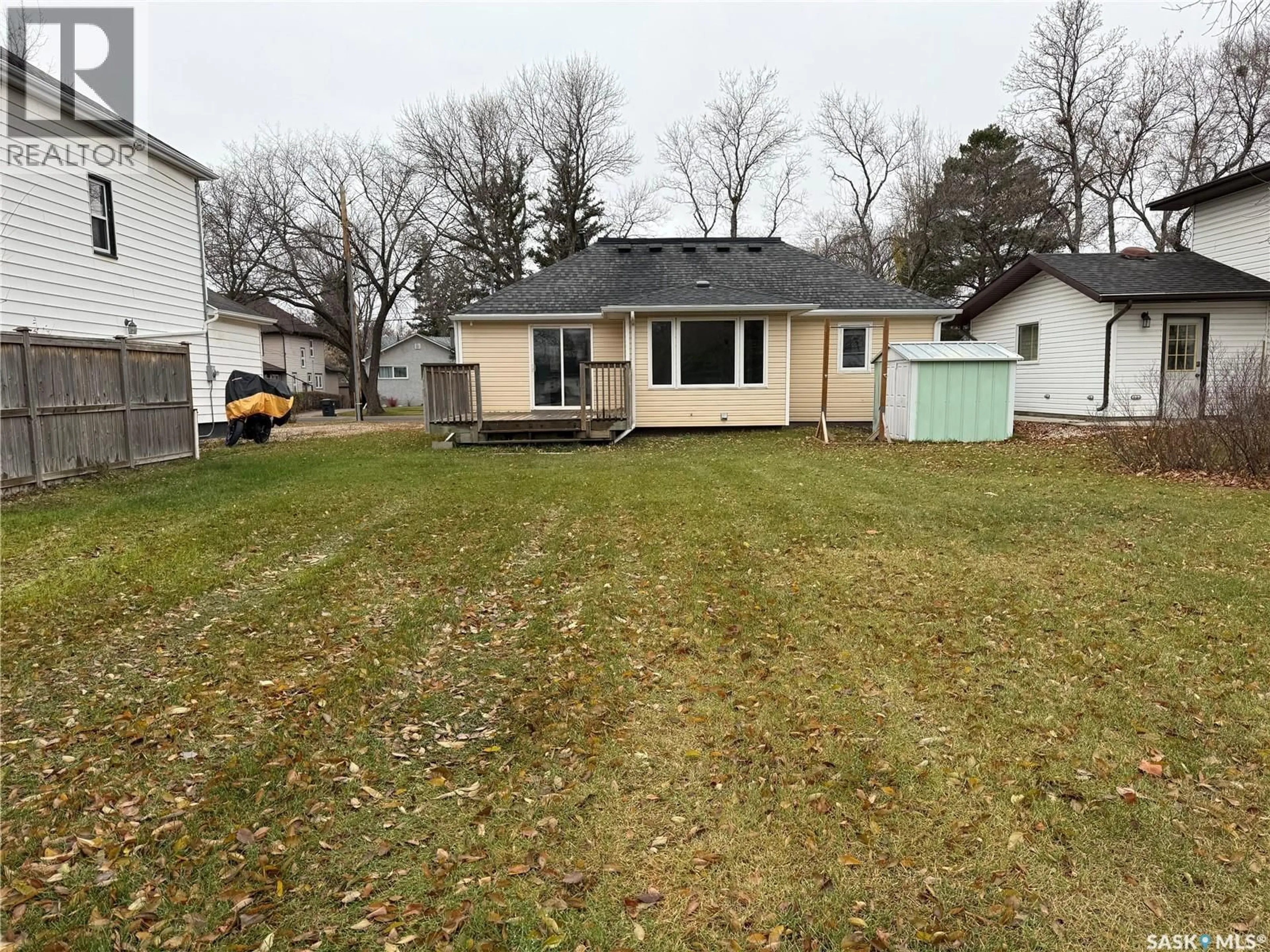 A pic from outside/outdoor area/front of a property/back of a property/a pic from drone, street for 426 6TH STREET, Weyburn Saskatchewan S4H1B6