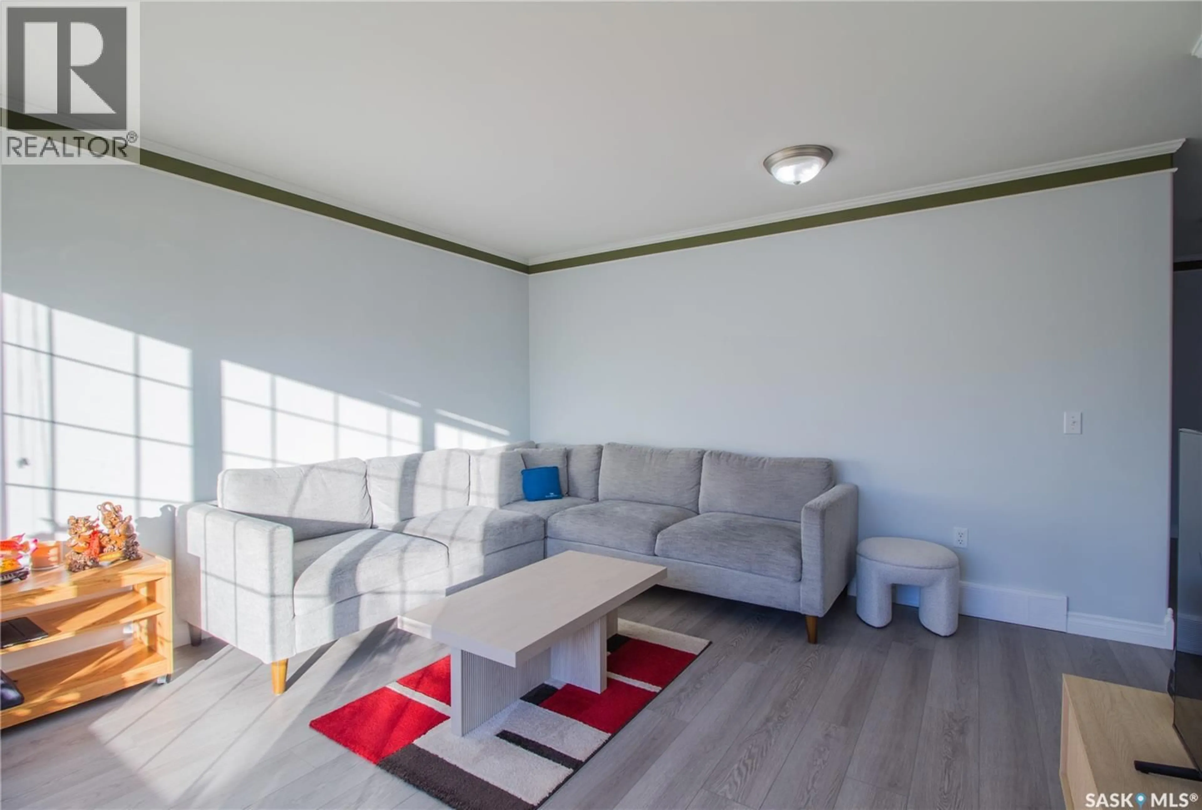 Living room with furniture, unknown for 322 7TH STREET, Humboldt Saskatchewan S0K2A0