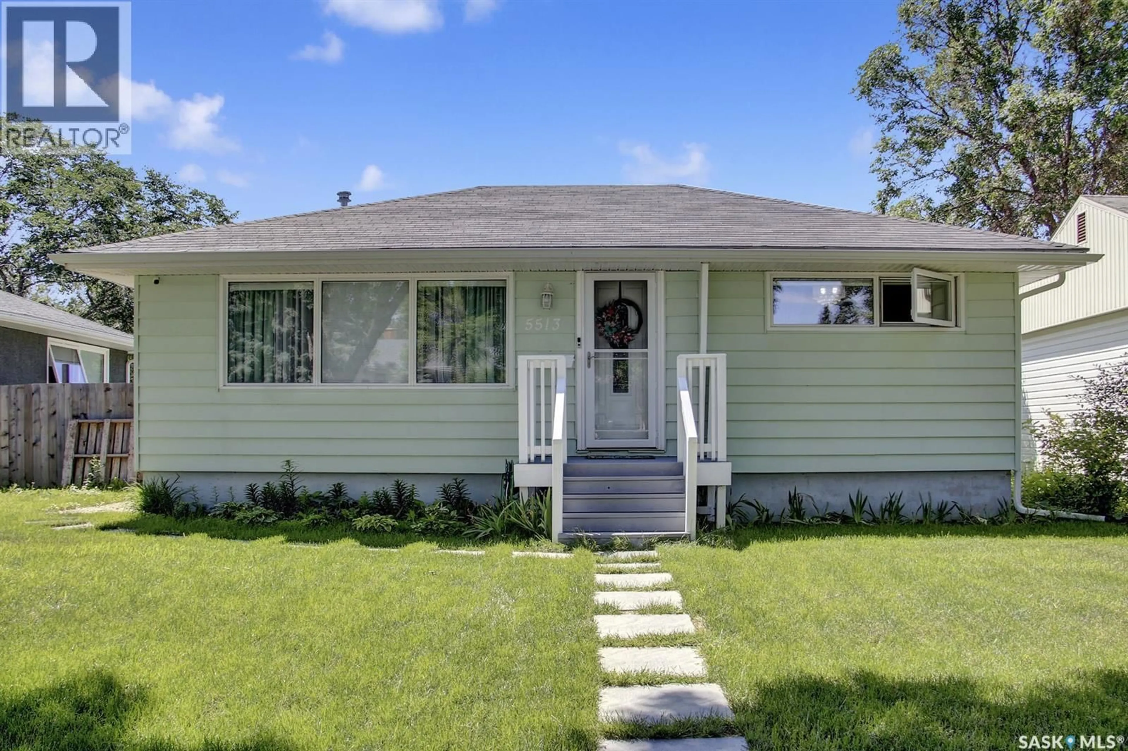 Home with vinyl exterior material, street for 5513 4TH AVENUE, Regina Saskatchewan S4T0K1