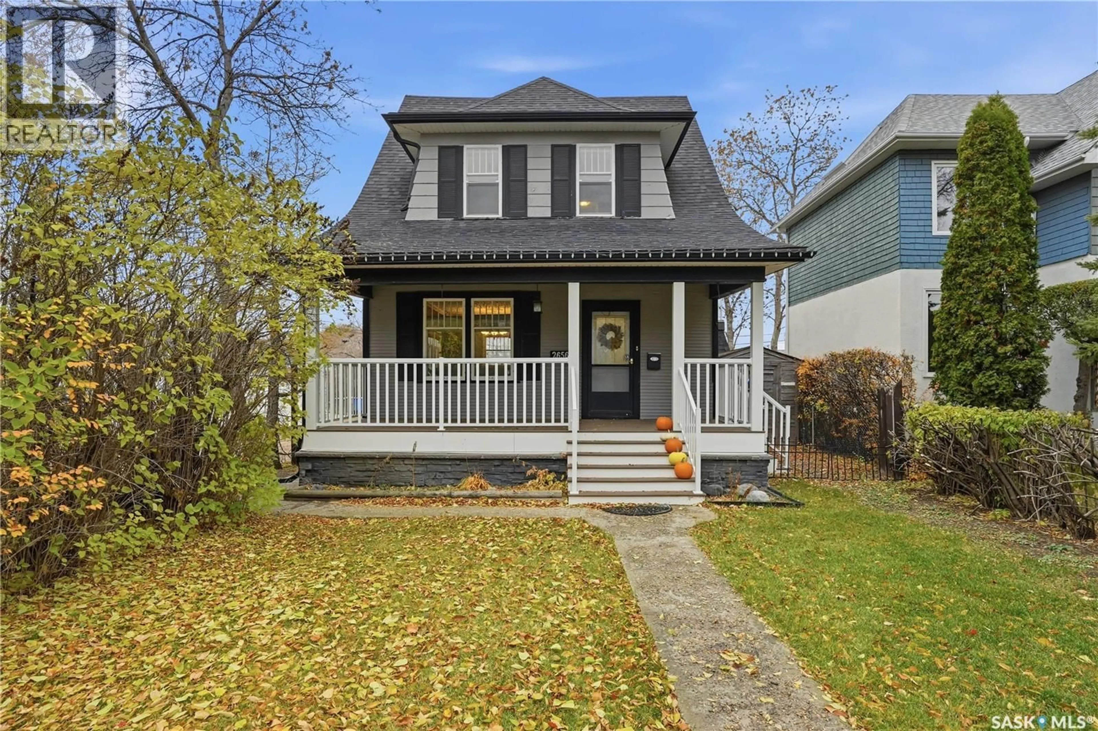 Home with vinyl exterior material, street for 2656 GARNET STREET, Regina Saskatchewan S4T3A7