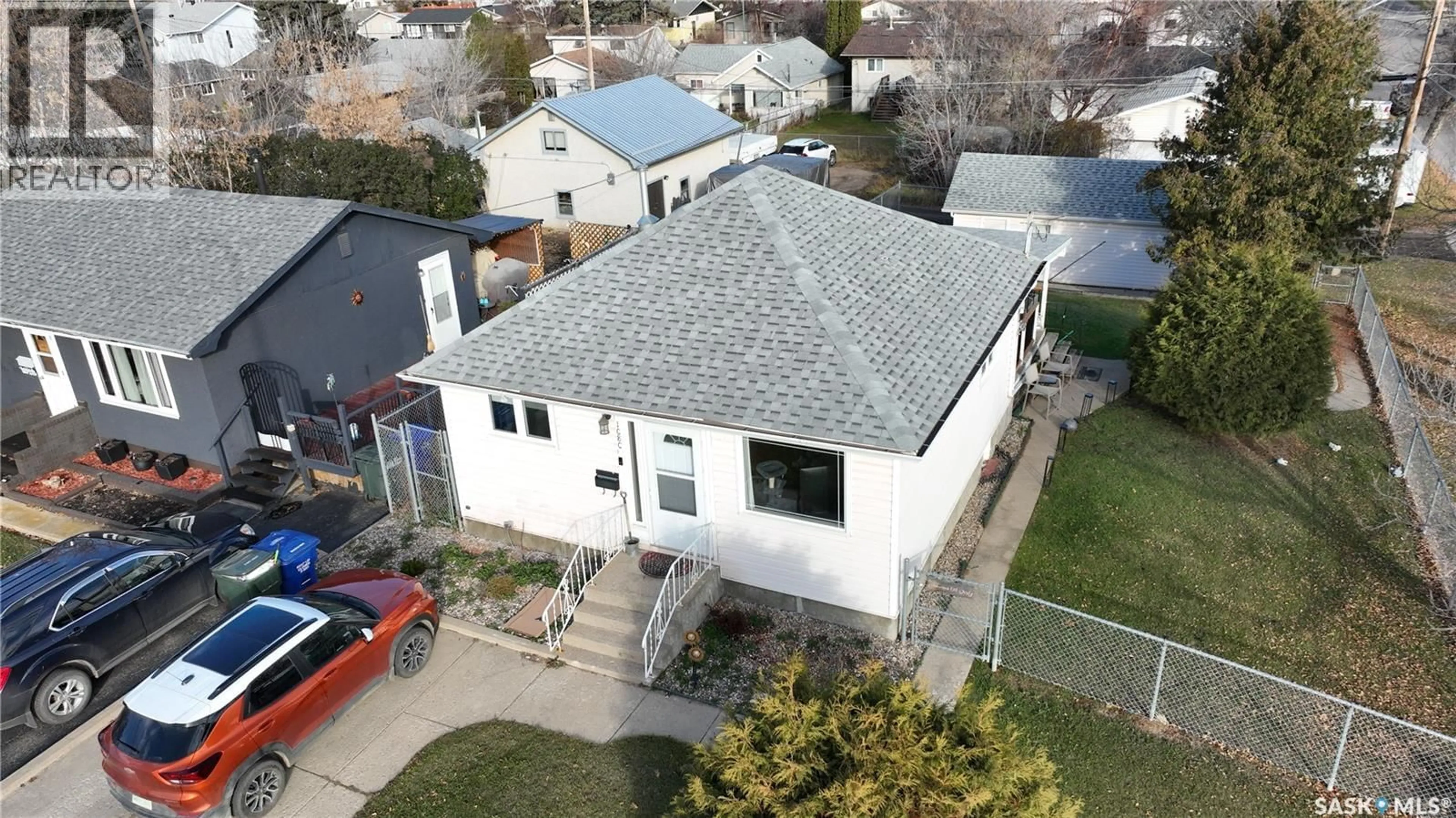 A pic from outside/outdoor area/front of a property/back of a property/a pic from drone, street for 1080 4TH STREET, Prince Albert Saskatchewan S6V0K9