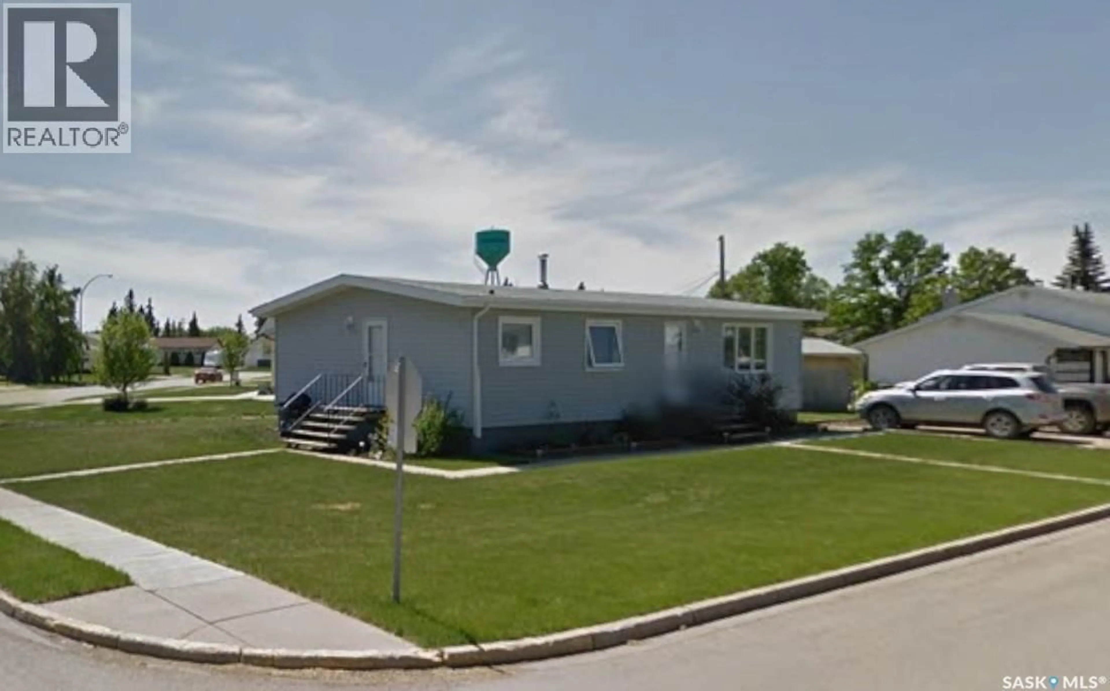 Home with vinyl exterior material, street for 120 SASKATCHEWAN CRESCENT, Kinistino Saskatchewan S0J1H0