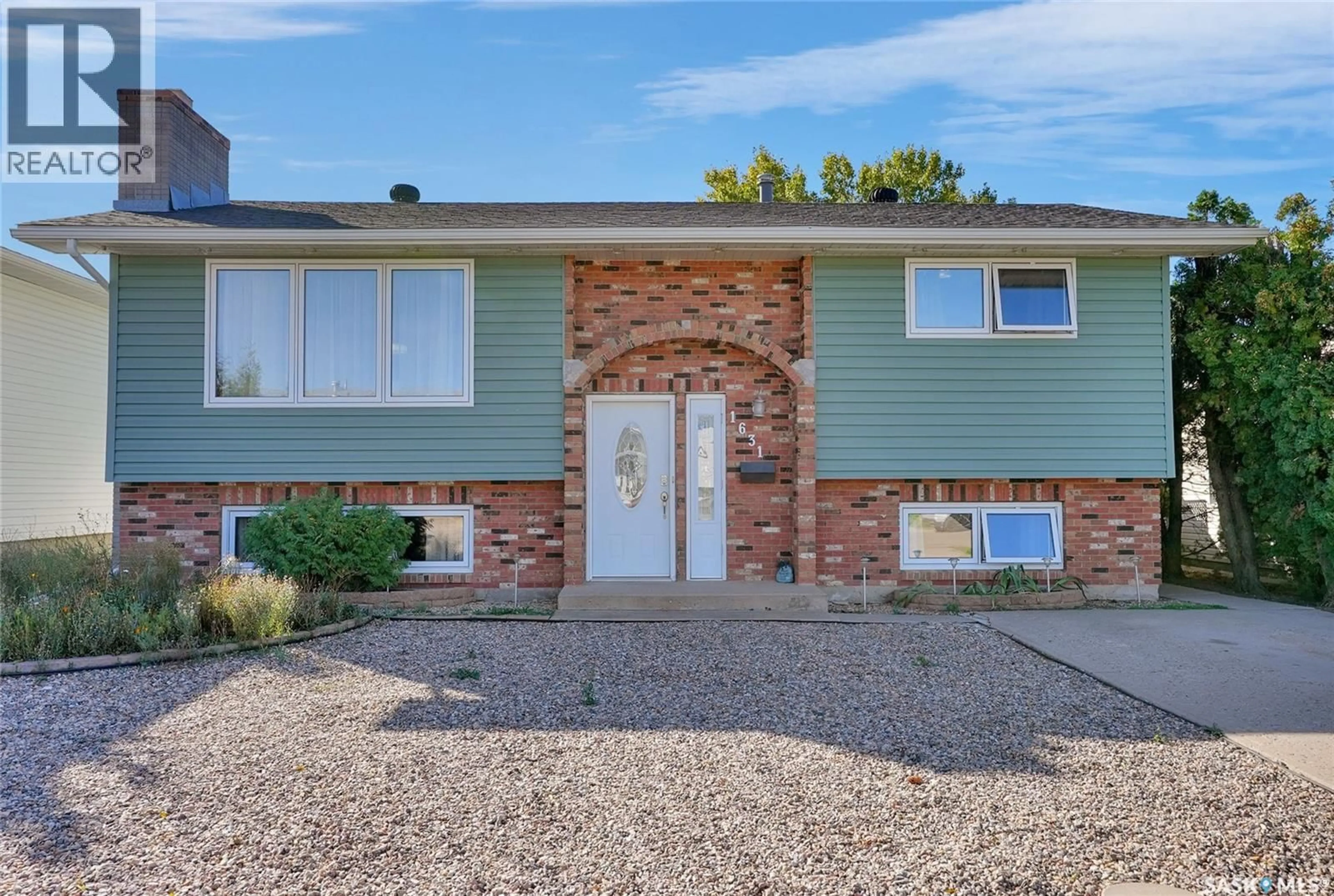 Home with brick exterior material, street for 1631 GLENDALE STREET, Moose Jaw Saskatchewan S6K1A9