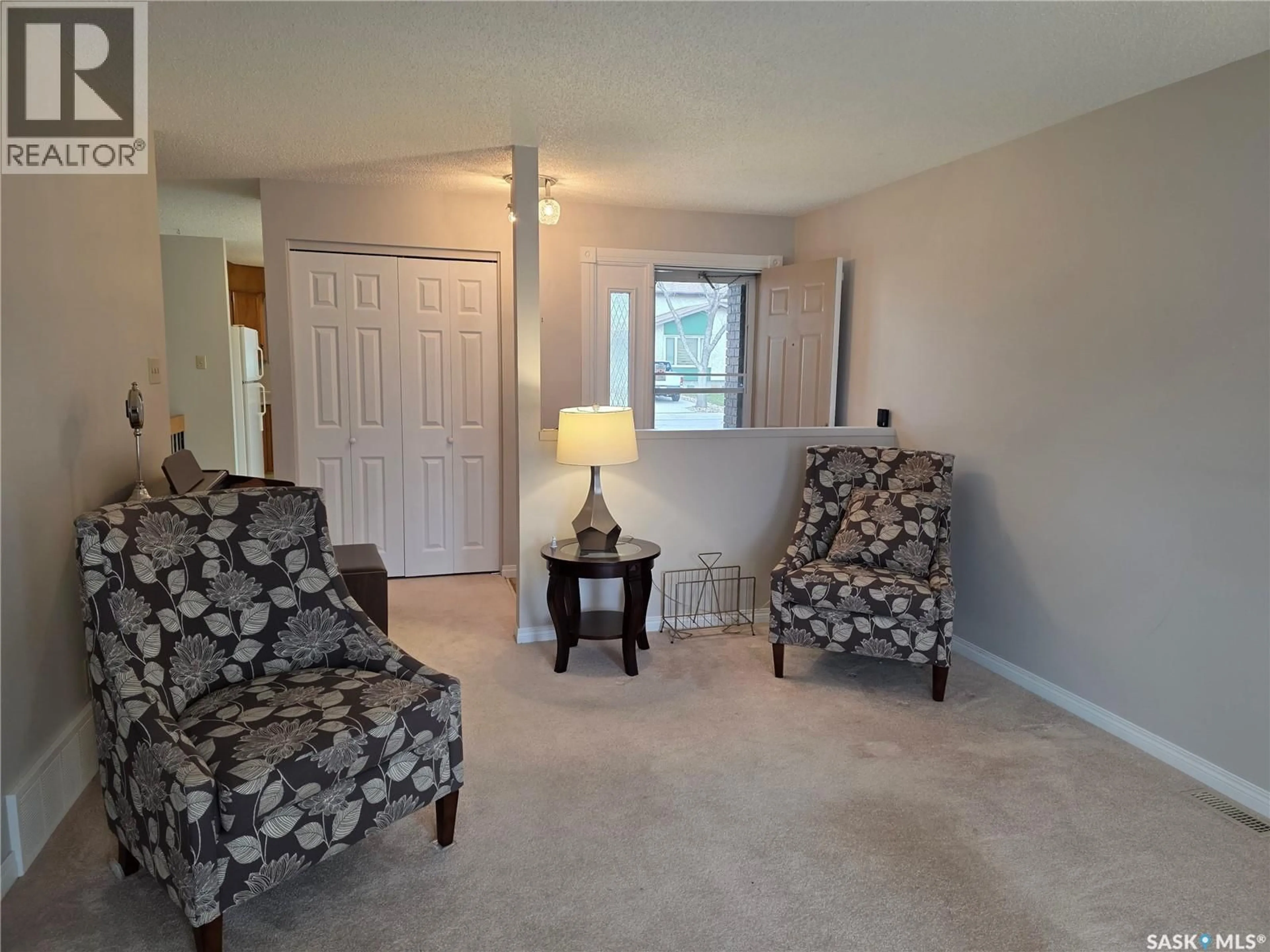 Living room with furniture, carpet floor for 1254 MCNEILL CRESCENT, Regina Saskatchewan S4N5Z4