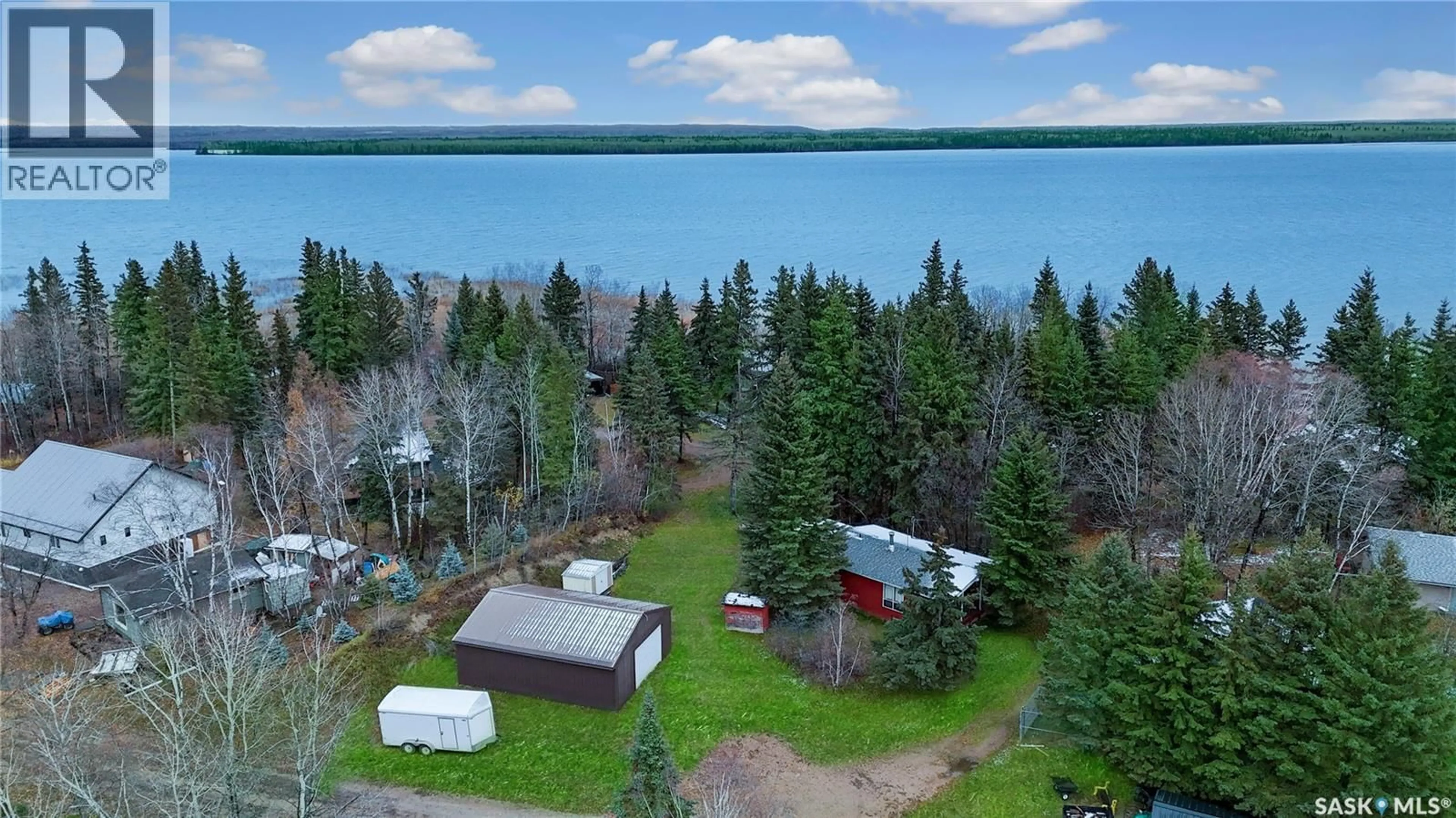 A pic from outside/outdoor area/front of a property/back of a property/a pic from drone, water/lake/river/ocean view for CORONS BEACH, Big River Rm No. 555 Saskatchewan S0J0E0