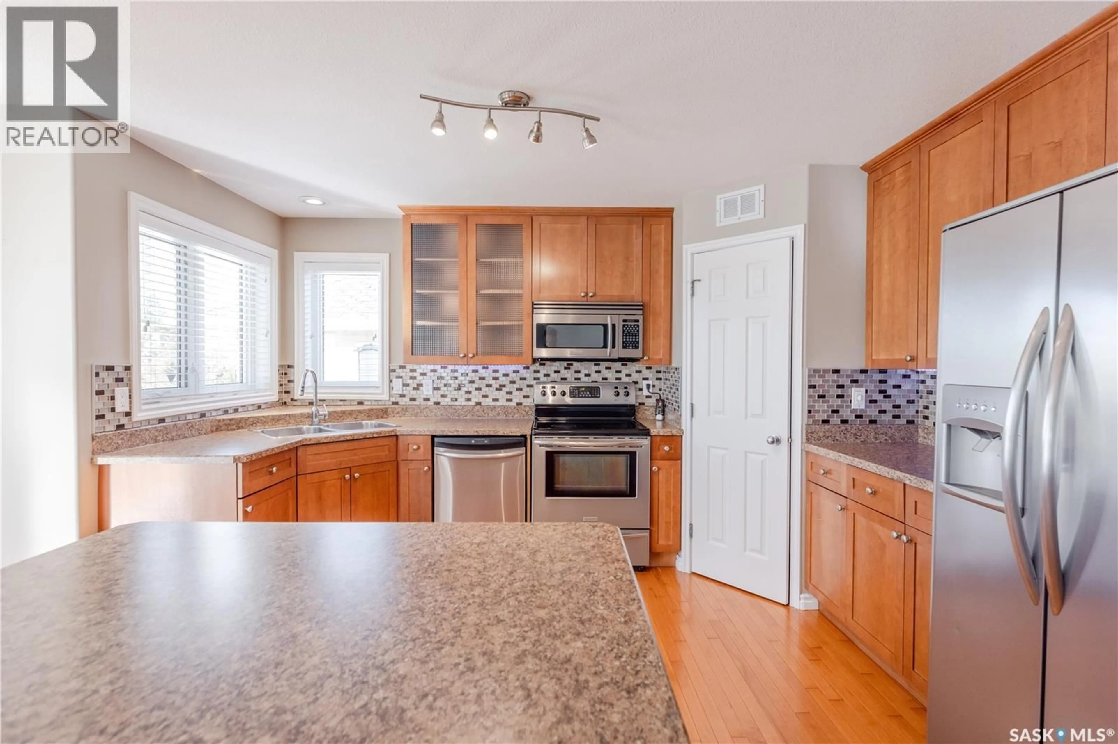 Open concept kitchen, ceramic/tile floor for 114 ALLWOOD CRESCENT, Saskatoon Saskatchewan S7R0A3