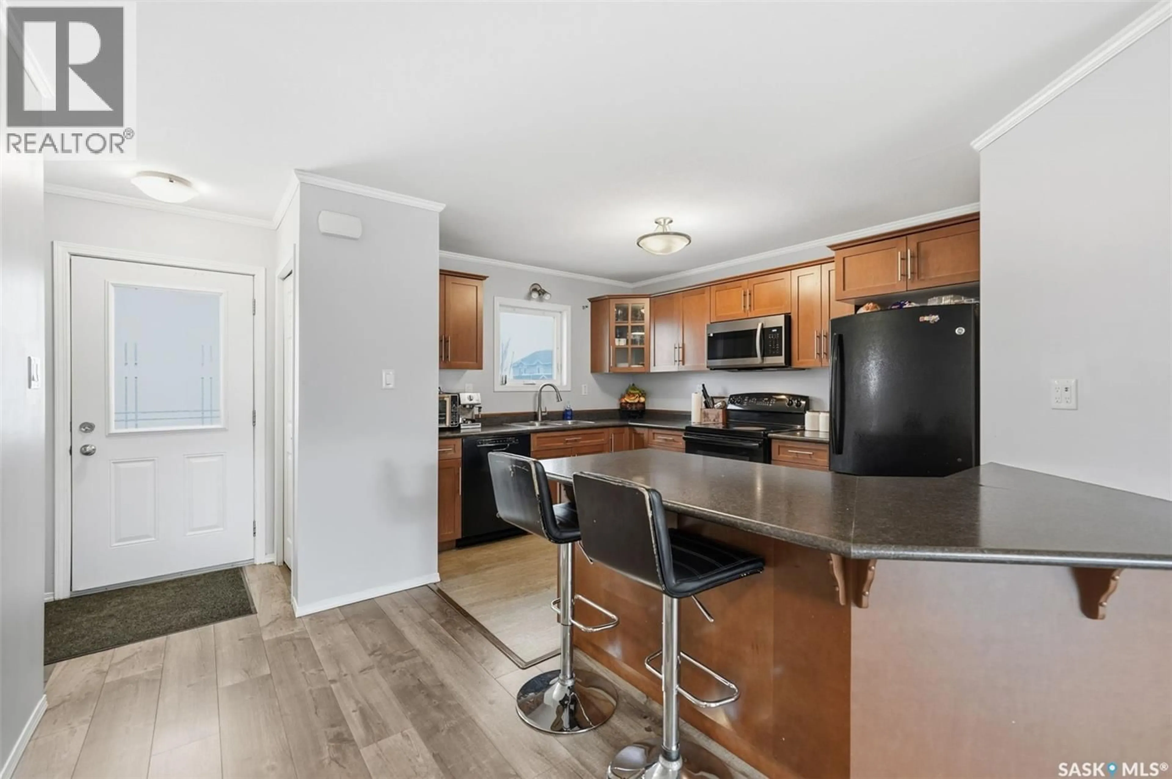 Open concept kitchen, unknown for 108 275 PRINGLE LANE, Saskatoon Saskatchewan S7T0T5