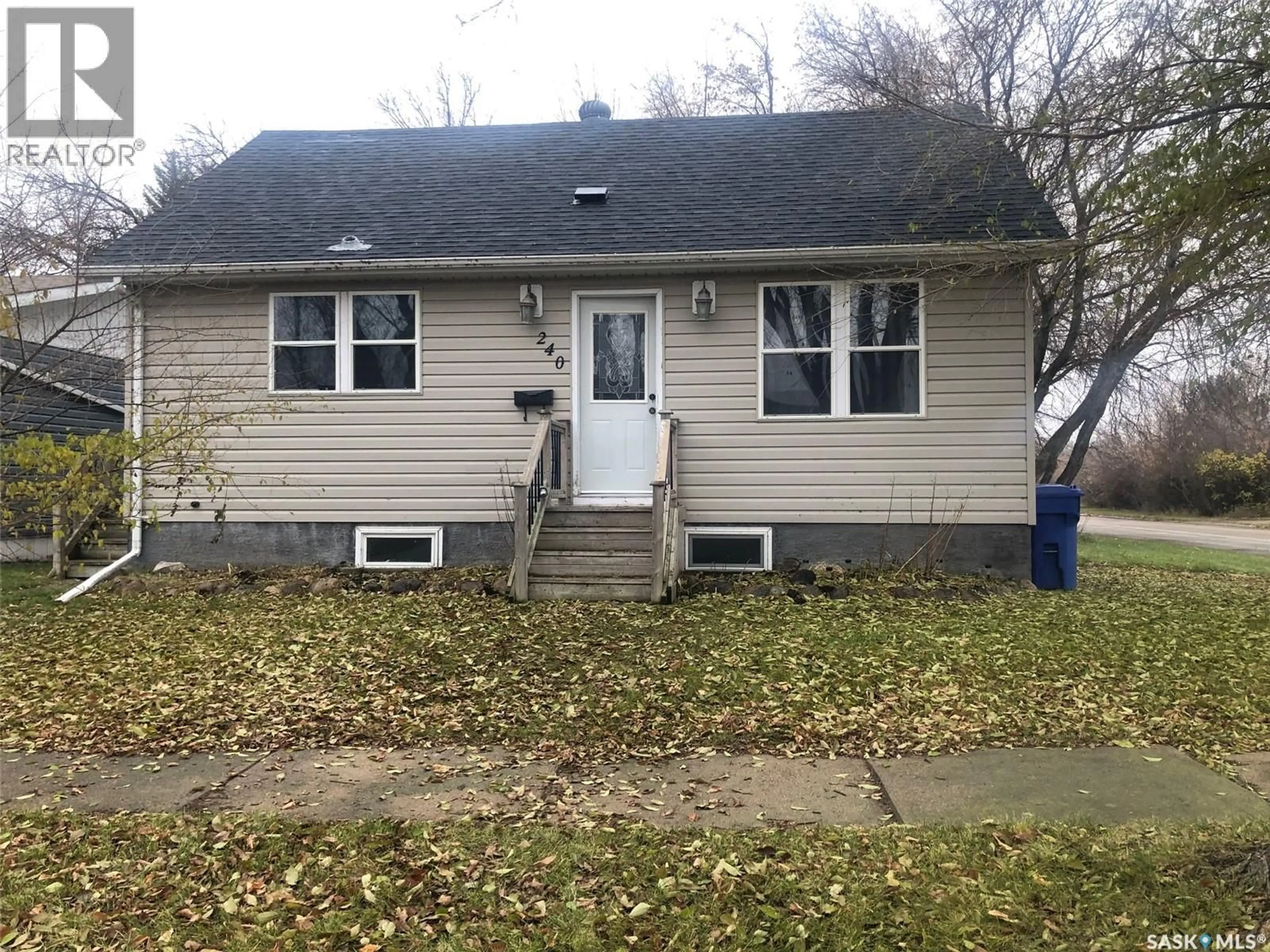 Home with vinyl exterior material, street for 240 3RD AVENUE, Canora Saskatchewan S0A0L0