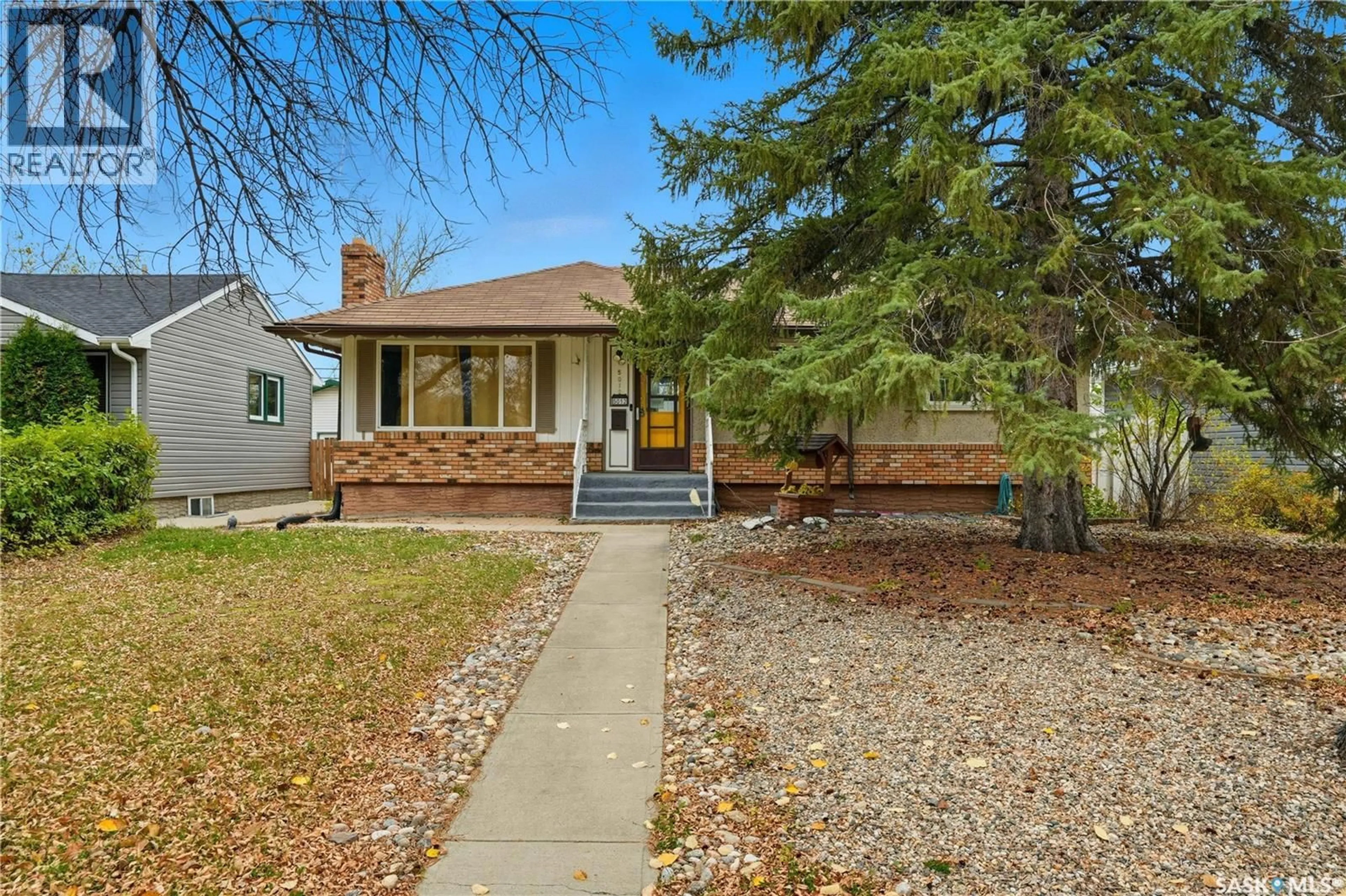 Home with vinyl exterior material, street for 5012 1ST AVENUE, Regina Saskatchewan S4T0A5