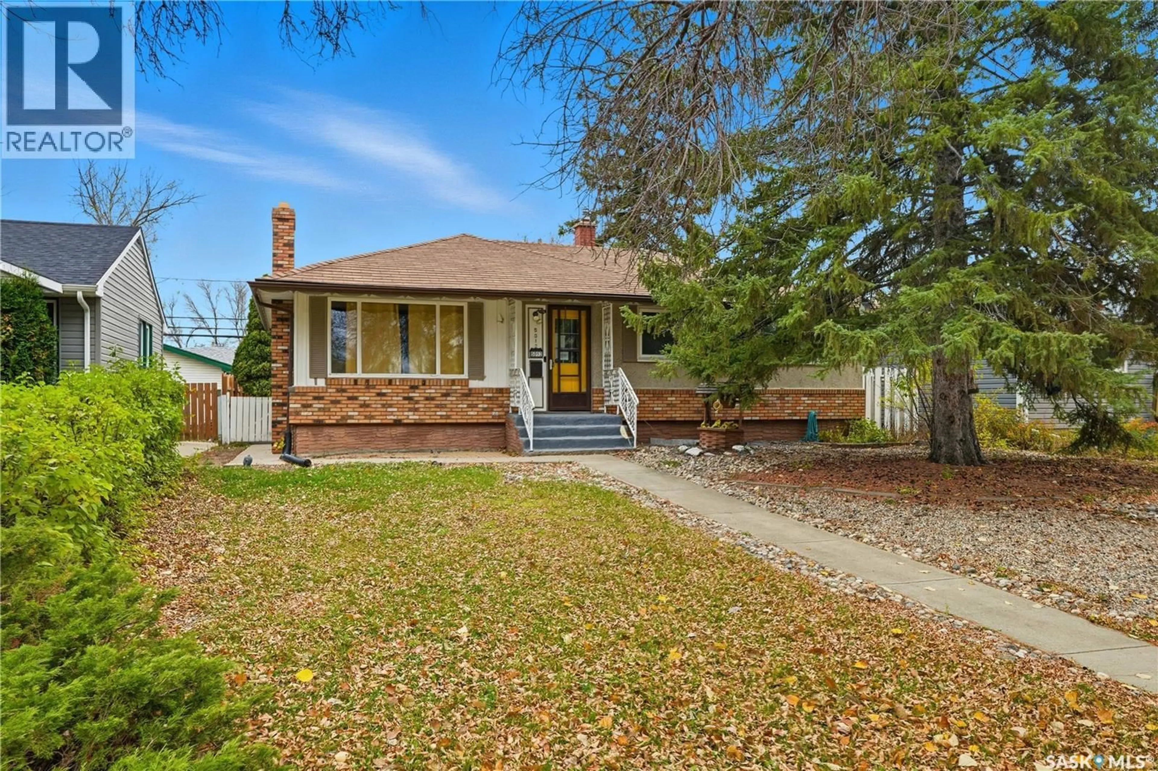 Home with brick exterior material, street for 5012 1ST AVENUE, Regina Saskatchewan S4T0A5