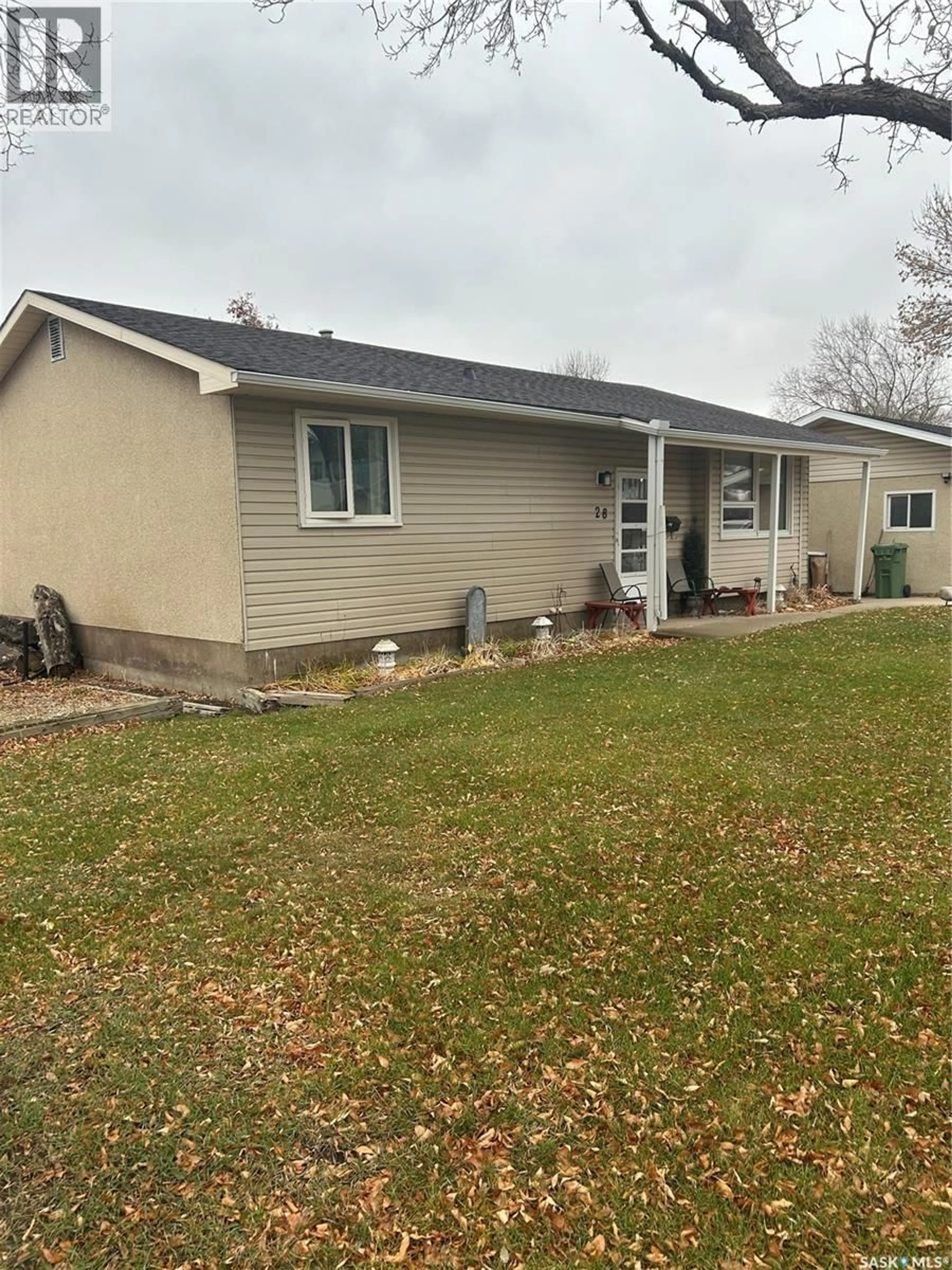 Home with vinyl exterior material, street for 28 CARMICHAEL ROAD, Regina Saskatchewan S4R0C5
