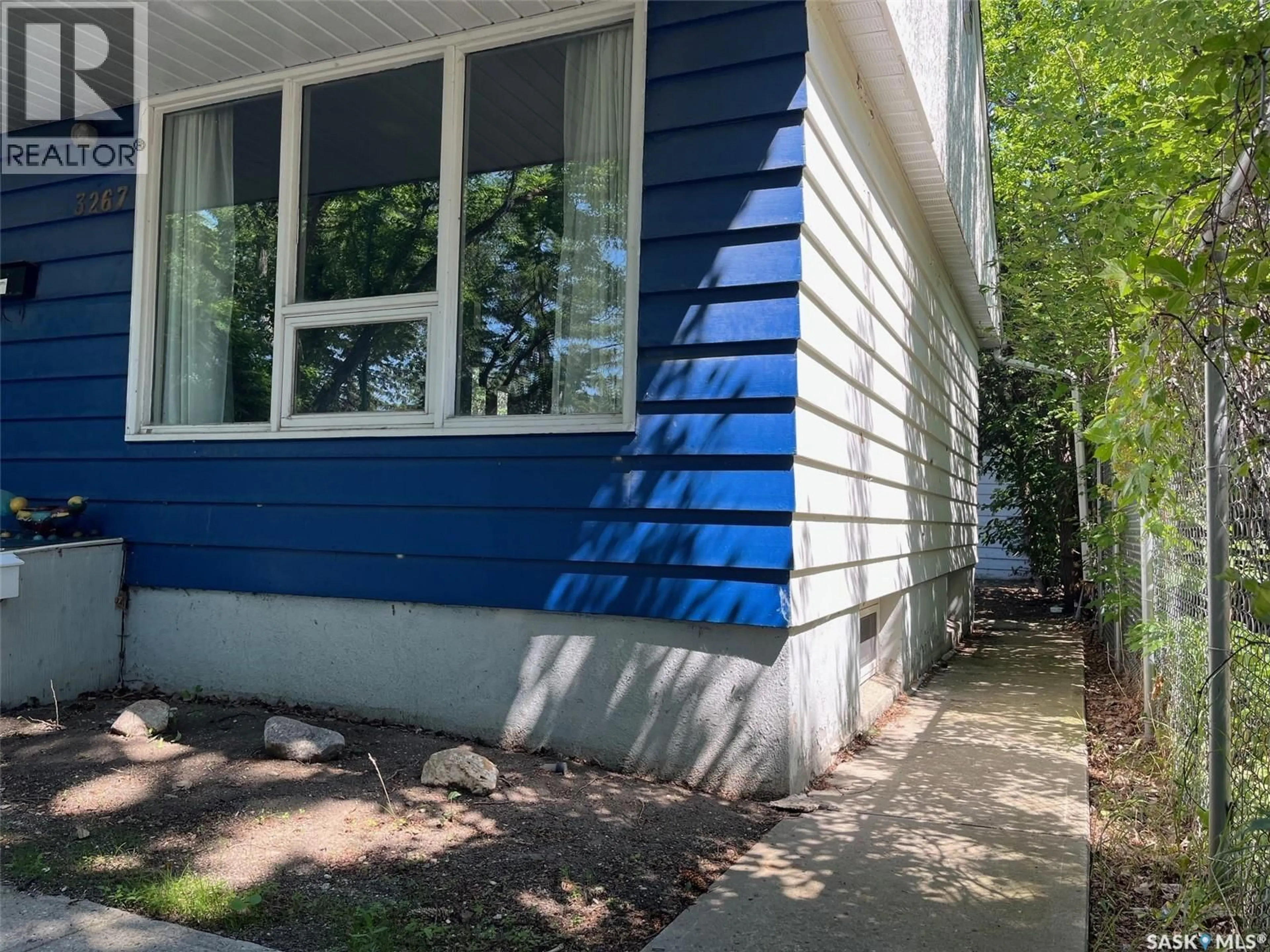 Home with vinyl exterior material, street for 3267 ATHOL STREET, Regina Saskatchewan S4S1Z1