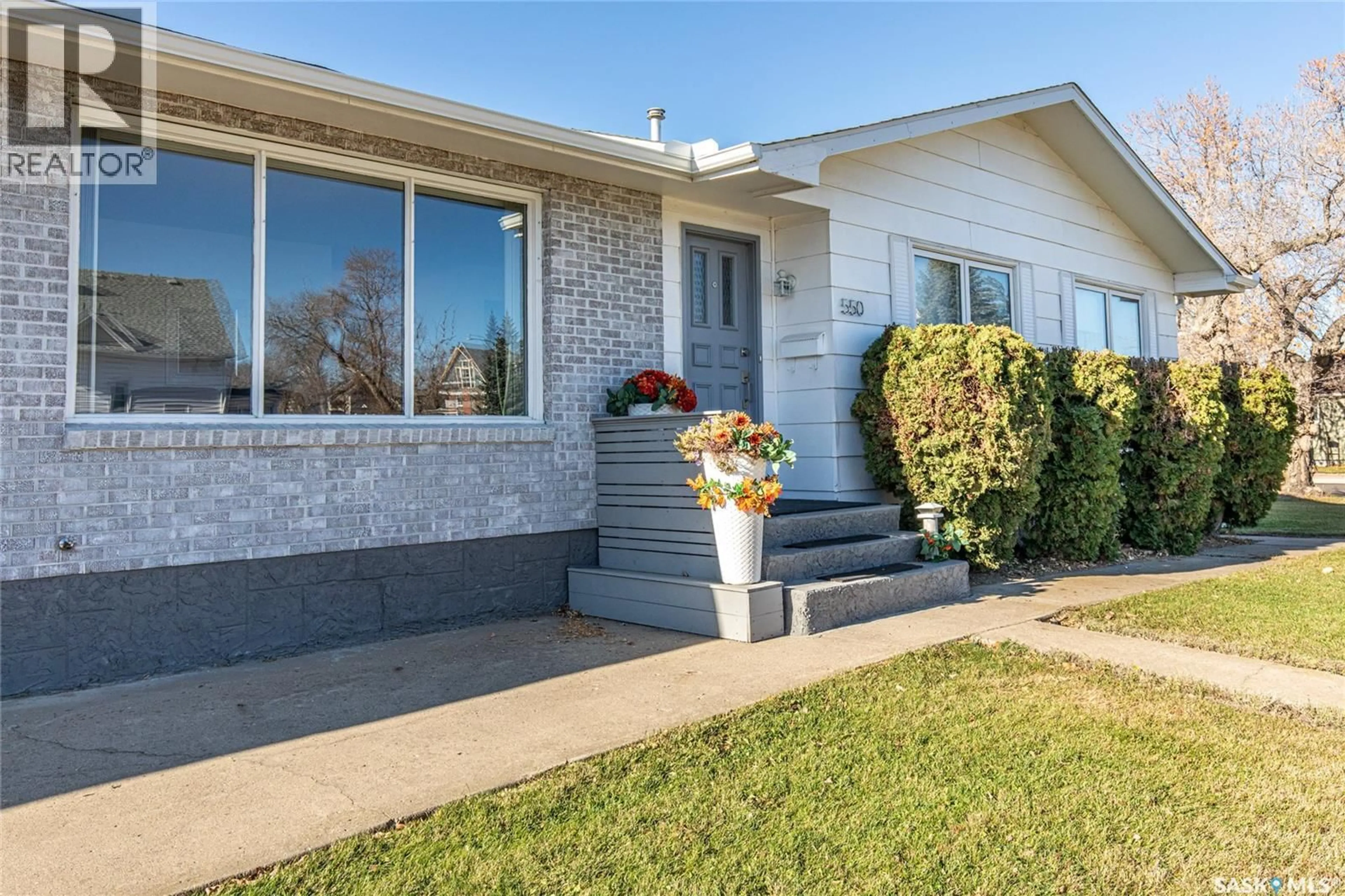 Home with vinyl exterior material, street for 550 3RD AVENUE, Moose Jaw Saskatchewan S6H7B6