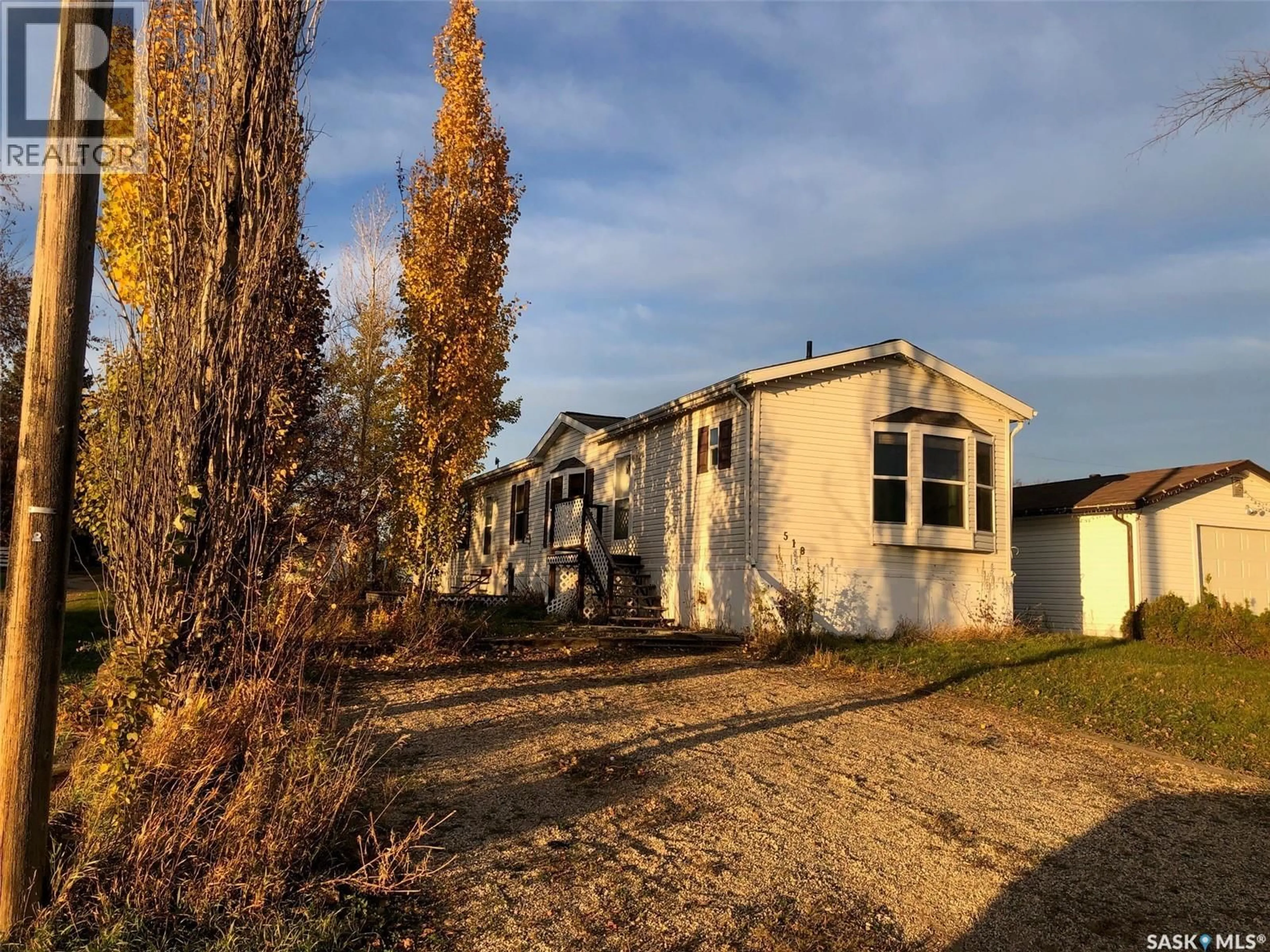A pic from outside/outdoor area/front of a property/back of a property/a pic from drone, street for 518 RAILWAY AVENUE, Preeceville Saskatchewan S0A3B0