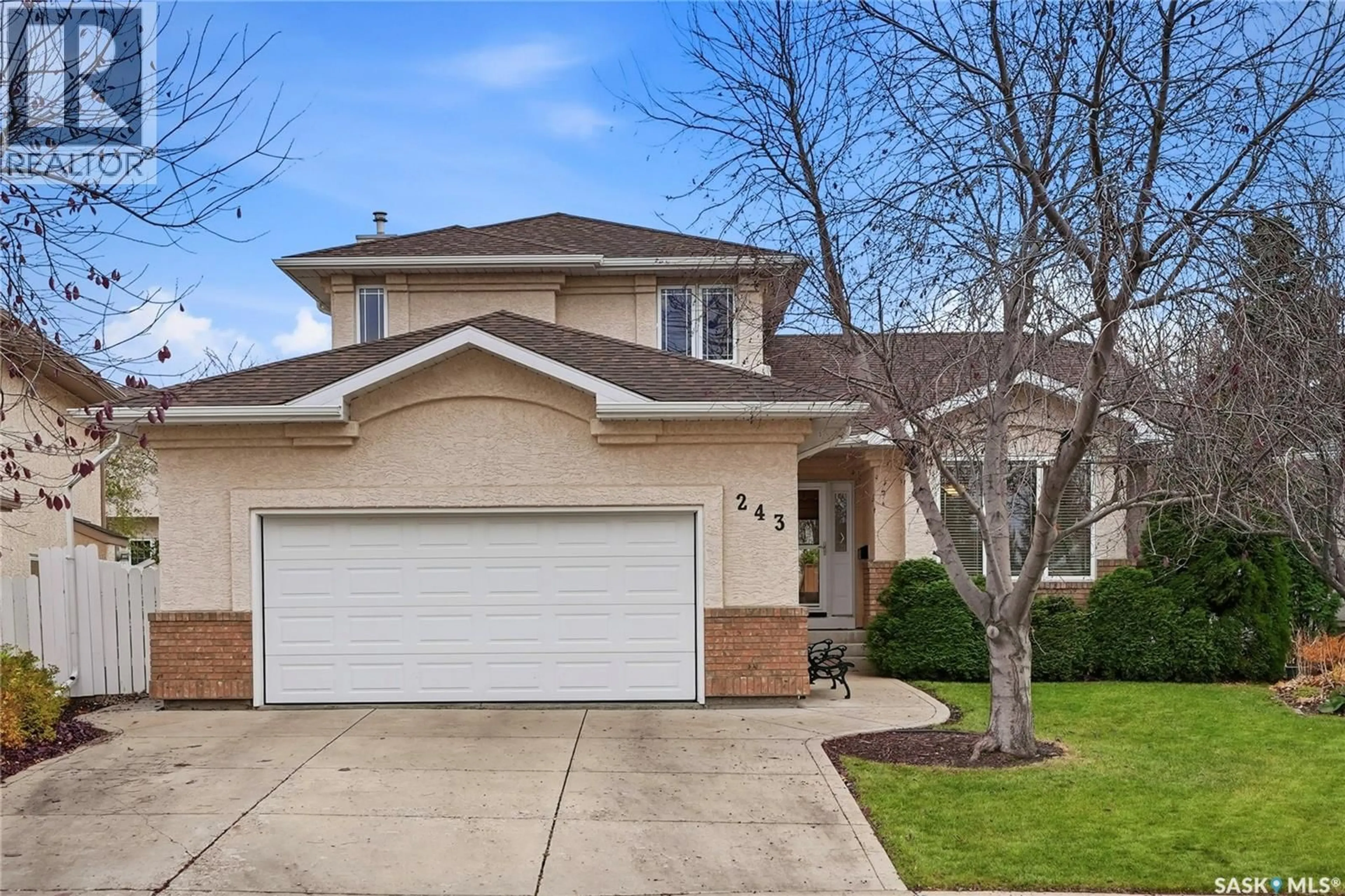 Home with vinyl exterior material, street for 243 BRIARVALE BAY, Saskatoon Saskatchewan S7V1B8