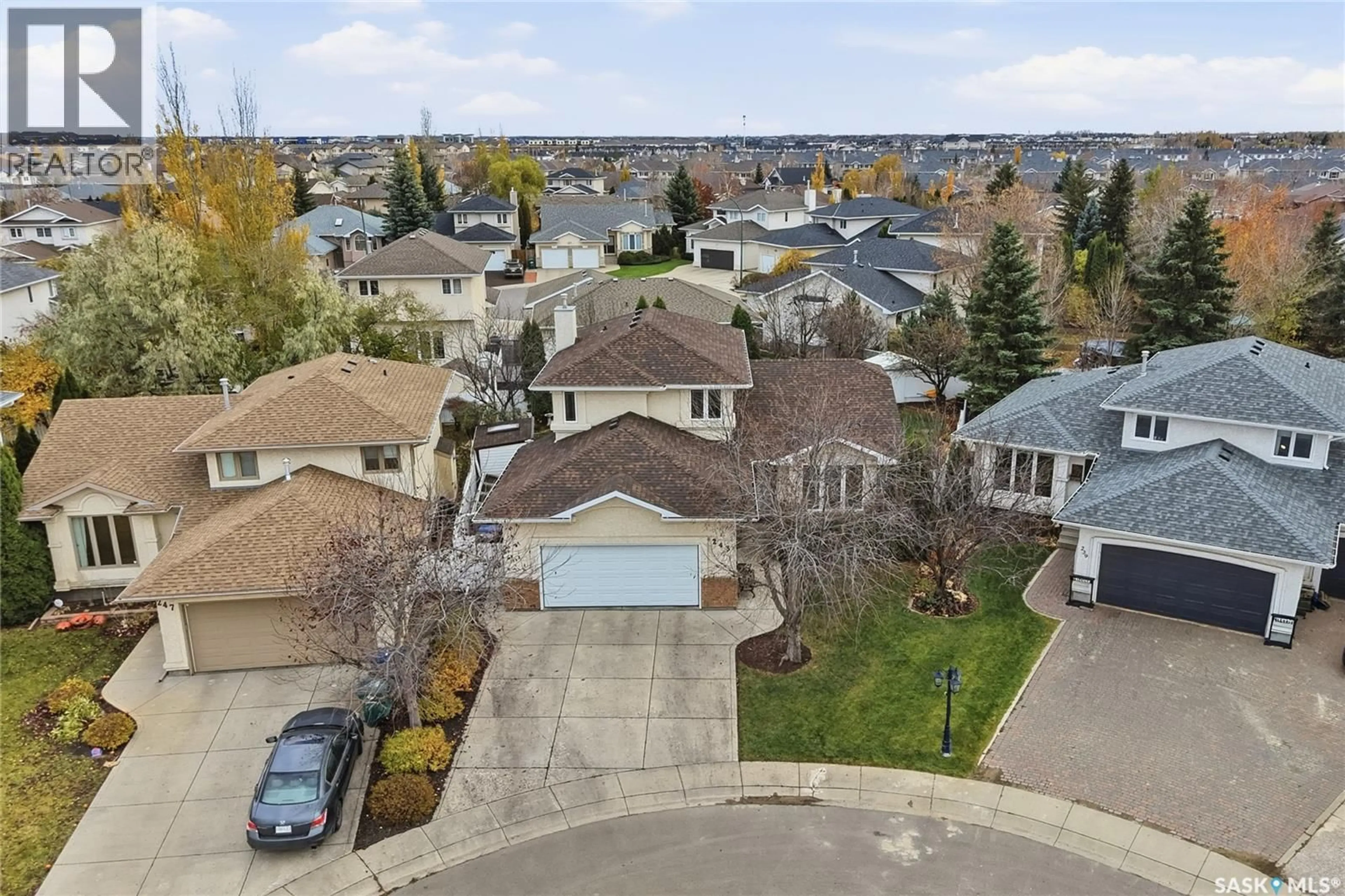 A pic from outside/outdoor area/front of a property/back of a property/a pic from drone, street for 243 BRIARVALE BAY, Saskatoon Saskatchewan S7V1B8
