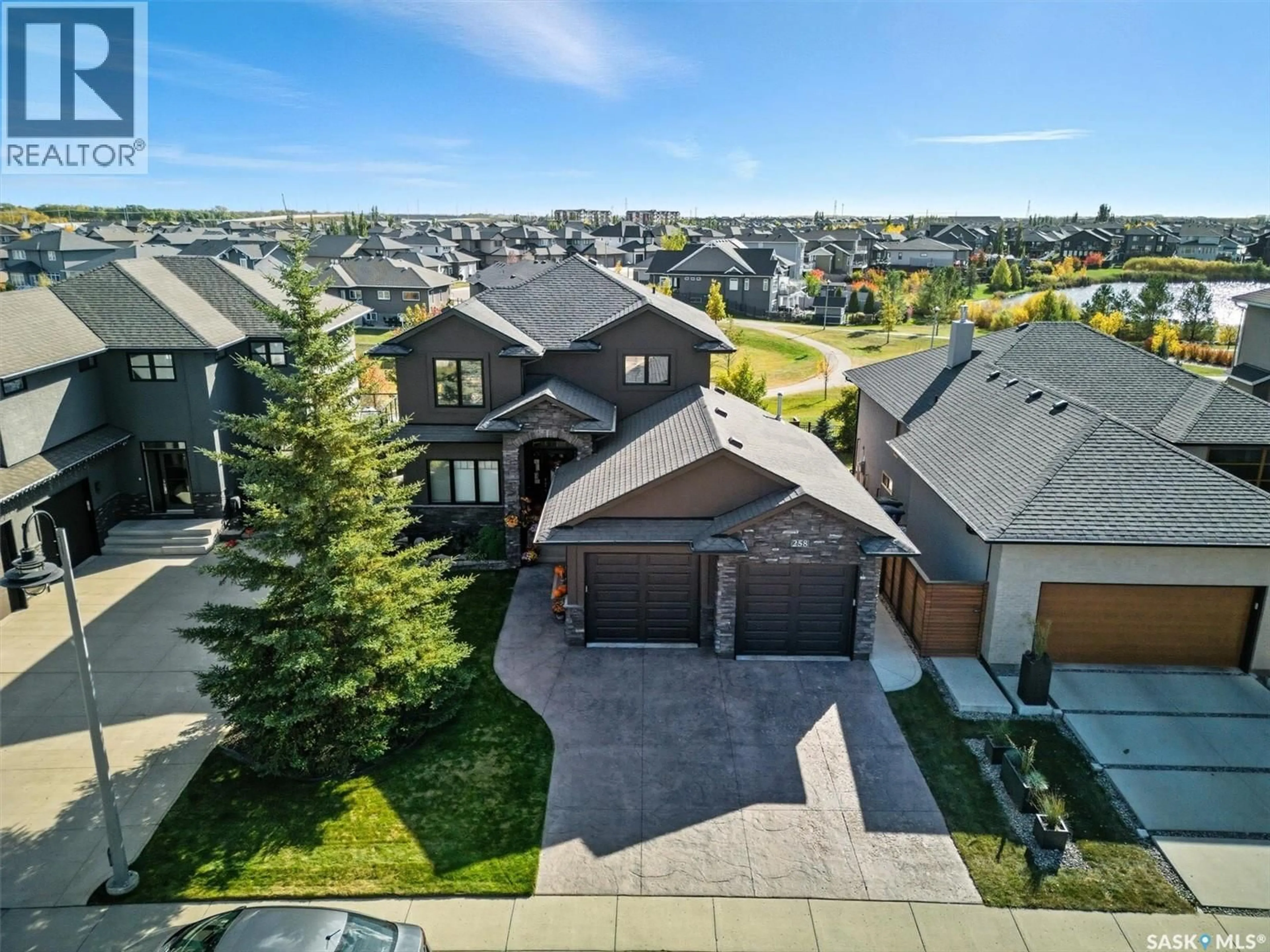A pic from outside/outdoor area/front of a property/back of a property/a pic from drone, street for 258 WHALLEY CRESCENT, Saskatoon Saskatchewan S7T0P1