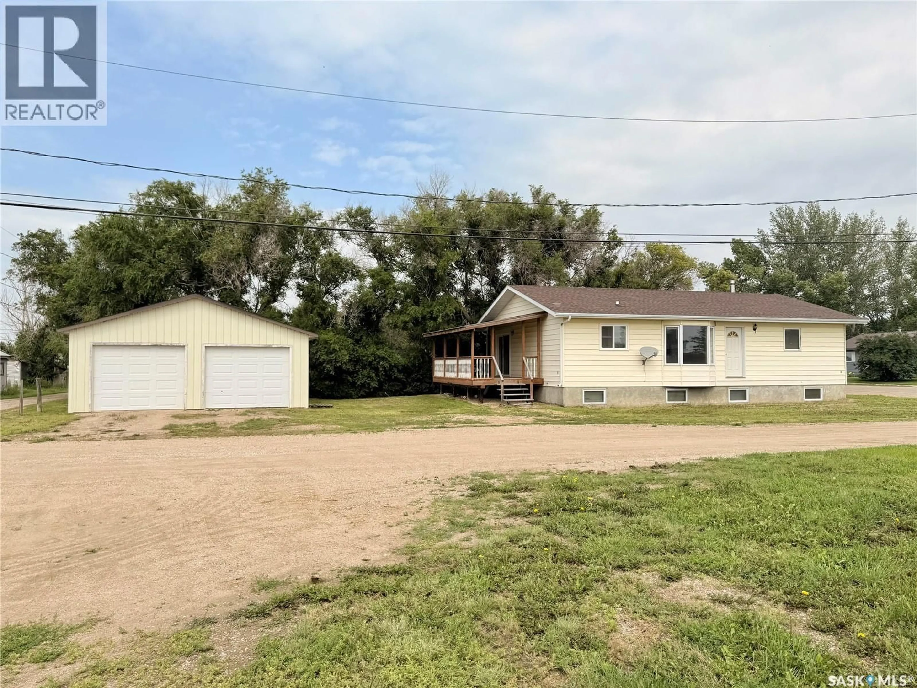A pic from outside/outdoor area/front of a property/back of a property/a pic from drone, street for 100 1ST AVENUE, Lucky Lake Saskatchewan S0L1Z0