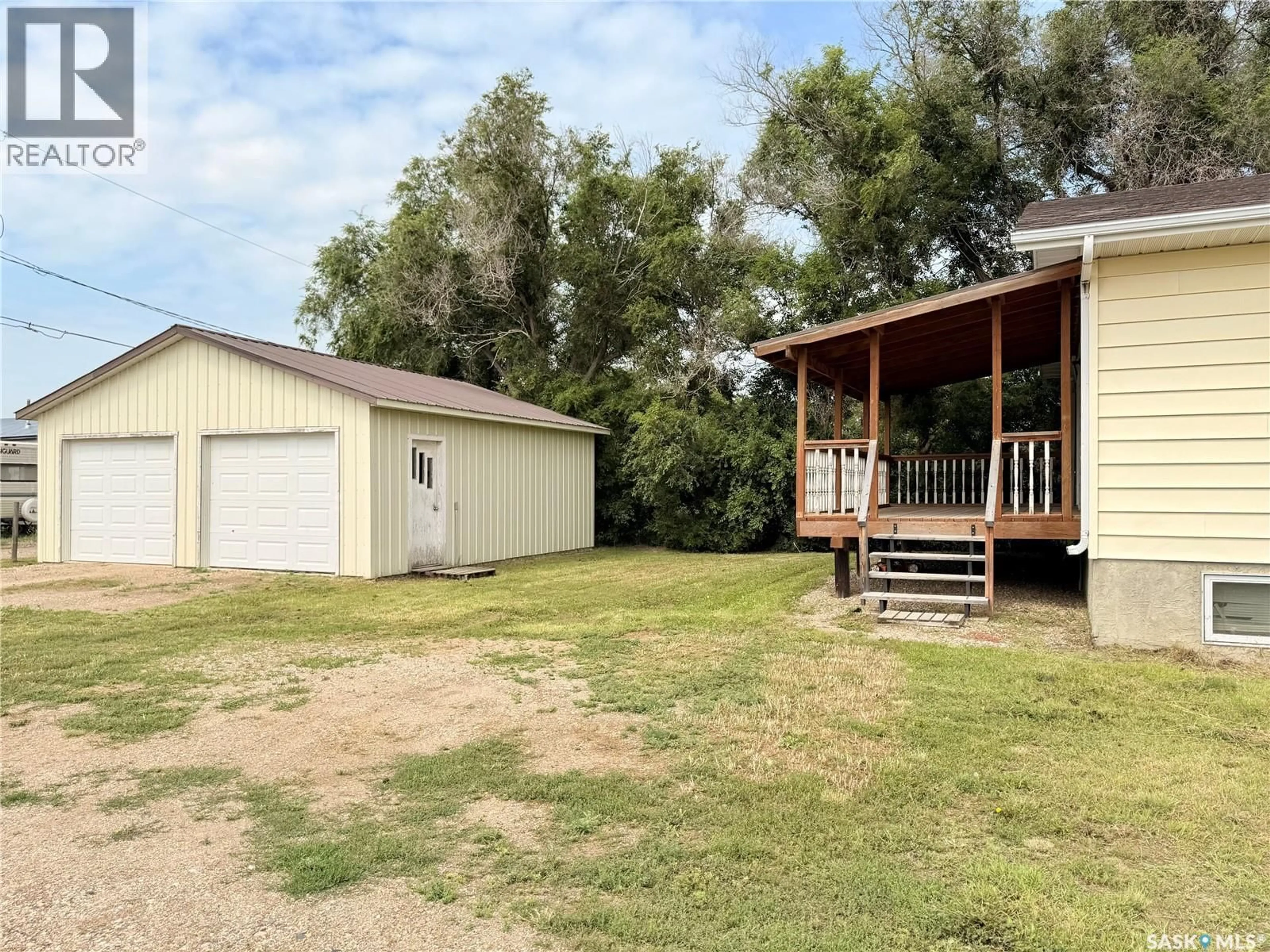 A pic from outside/outdoor area/front of a property/back of a property/a pic from drone, unknown for 100 1ST AVENUE, Lucky Lake Saskatchewan S0L1Z0