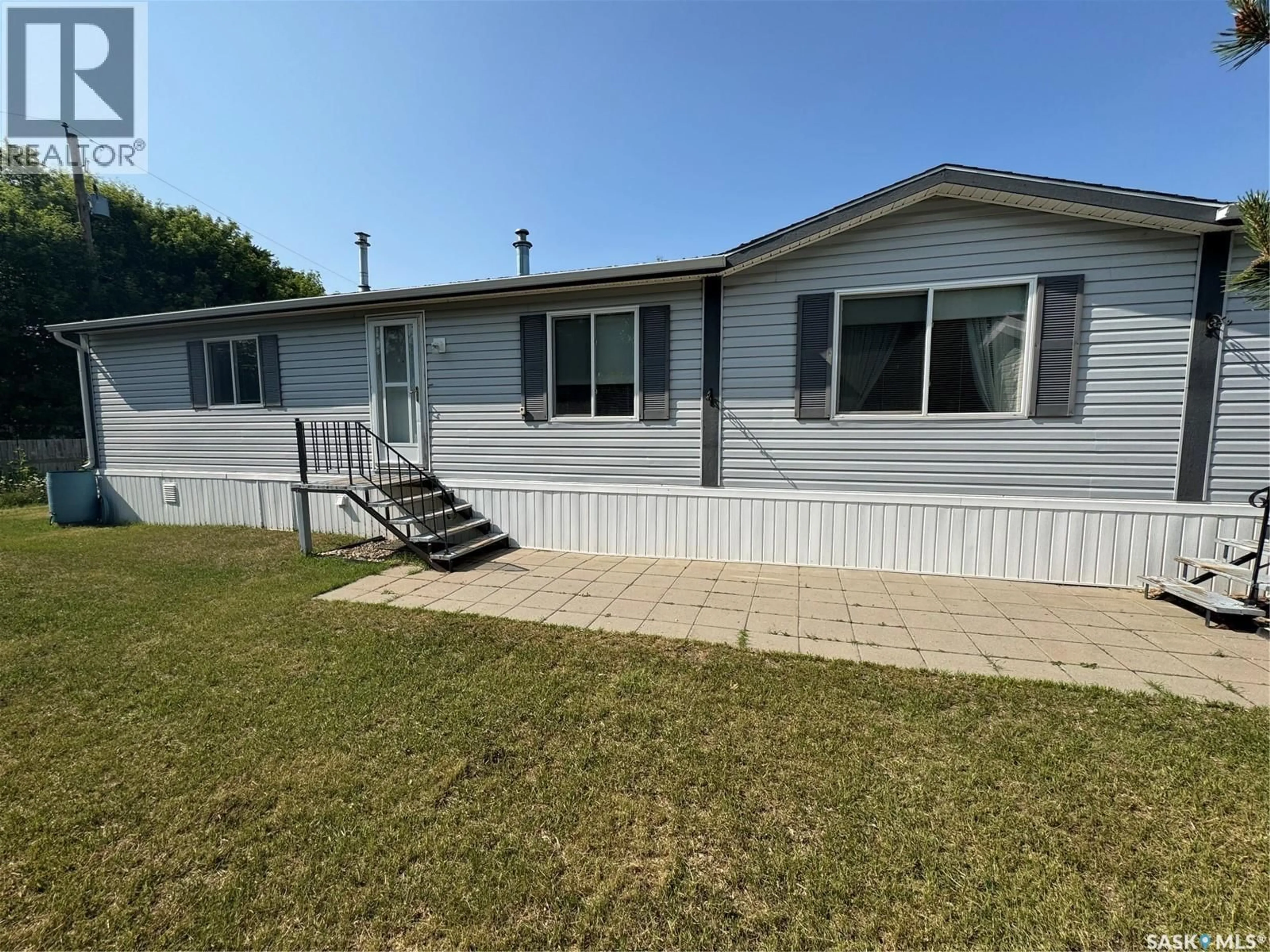 Home with vinyl exterior material, water/lake/river/ocean view for 310 CHRISTIE STREET, Outlook Saskatchewan S0L2N0