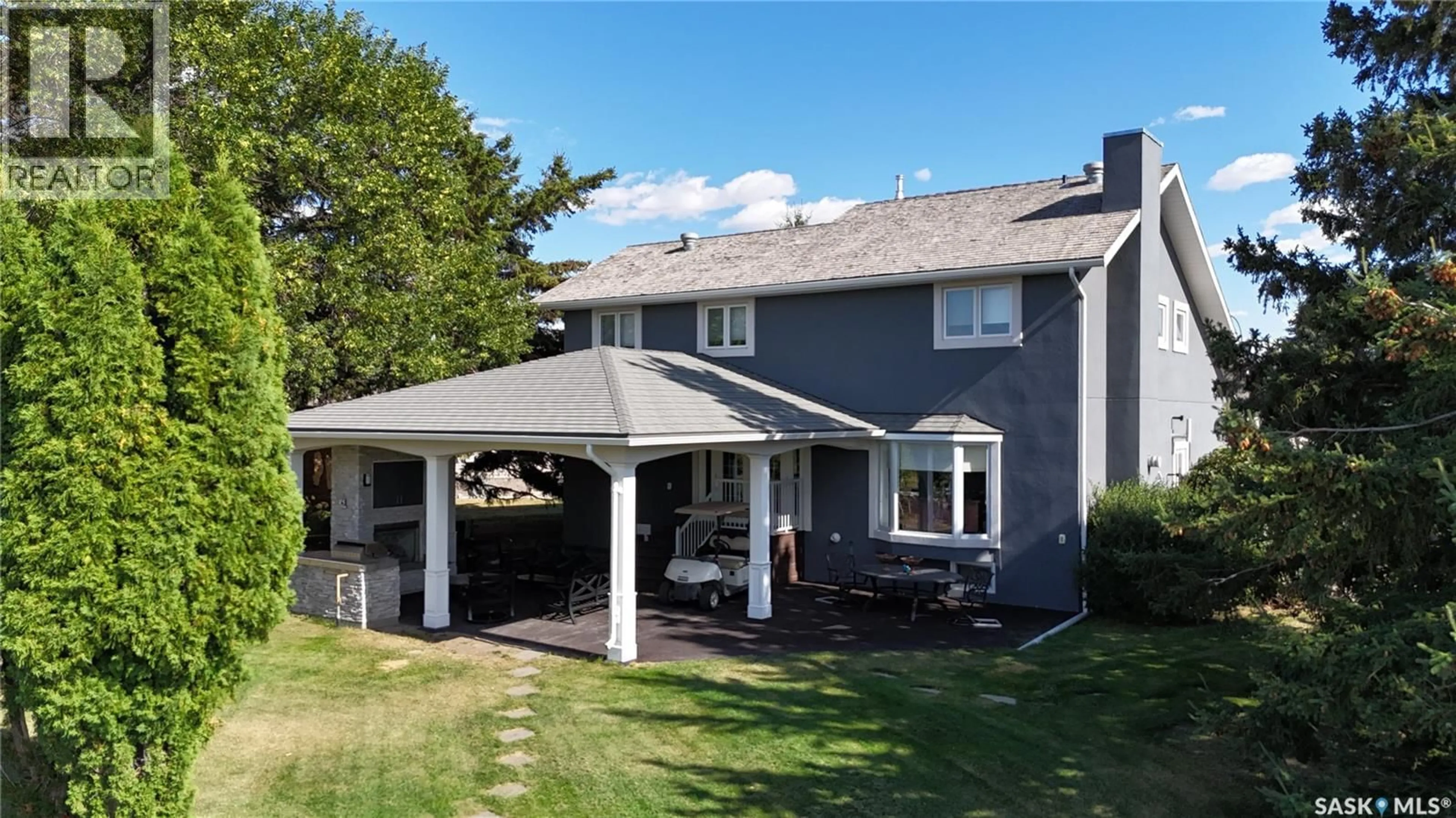 Home with vinyl exterior material, street for 5 POPLAR PLACE, Outlook Saskatchewan S0L2N0