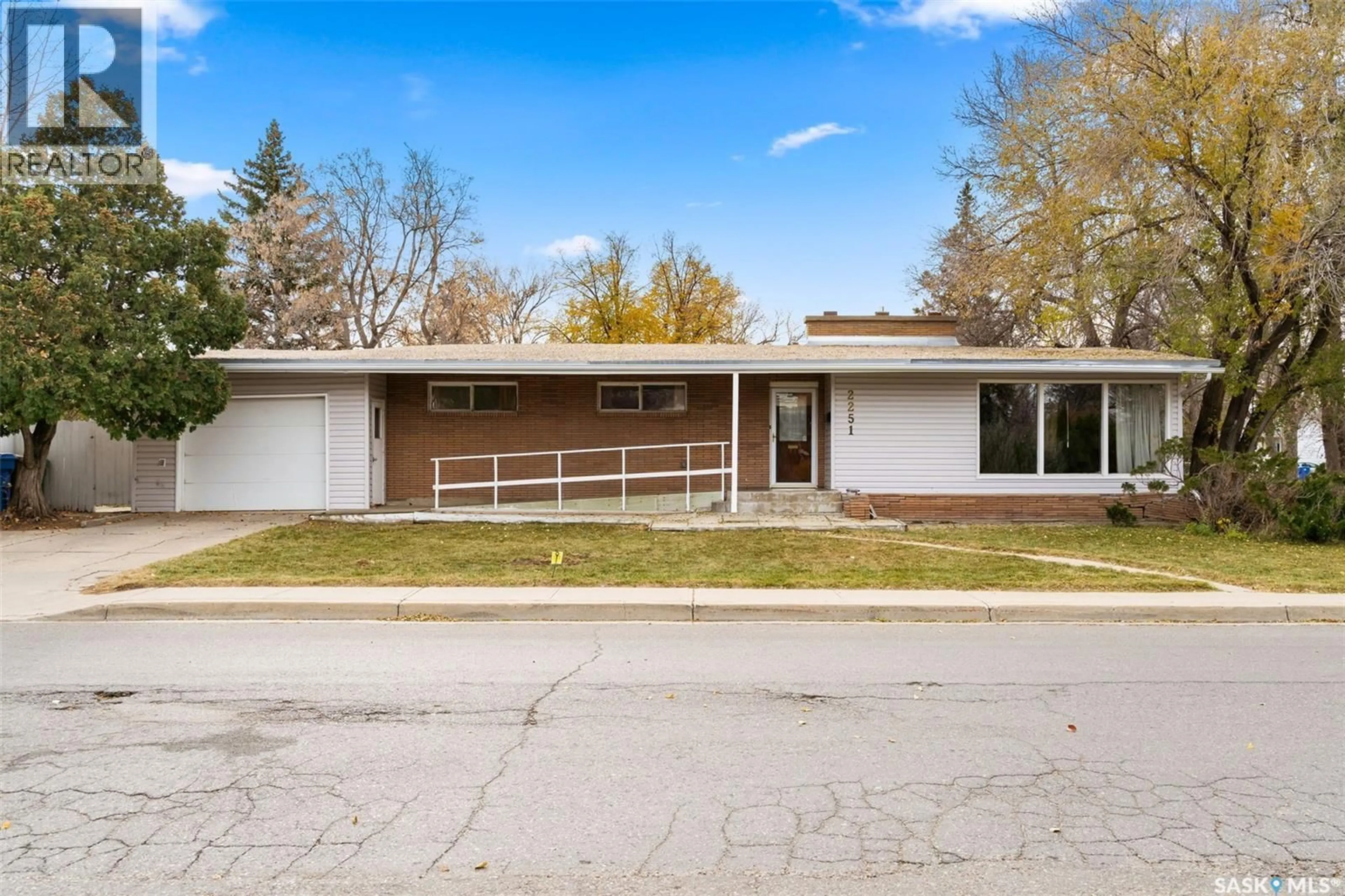 Home with brick exterior material, street for 2251 JUBILEE AVENUE, Regina Saskatchewan S4S3V3