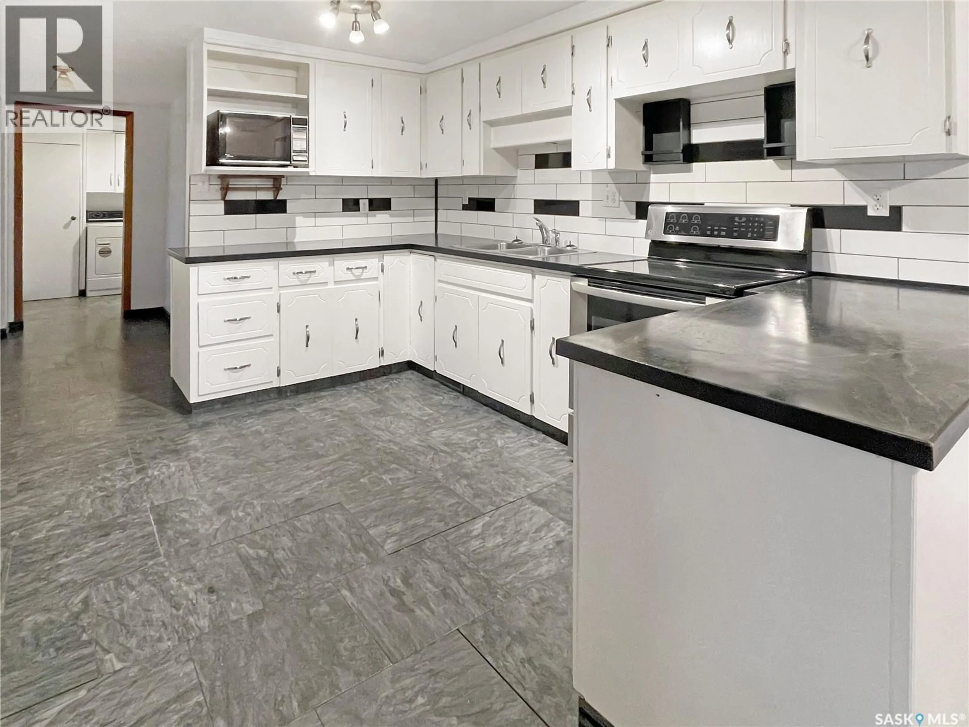 Open concept kitchen, ceramic/tile floor for 215A PELLETIER DRIVE, Lac Pelletier Rm No. 107 Saskatchewan S0N1T0