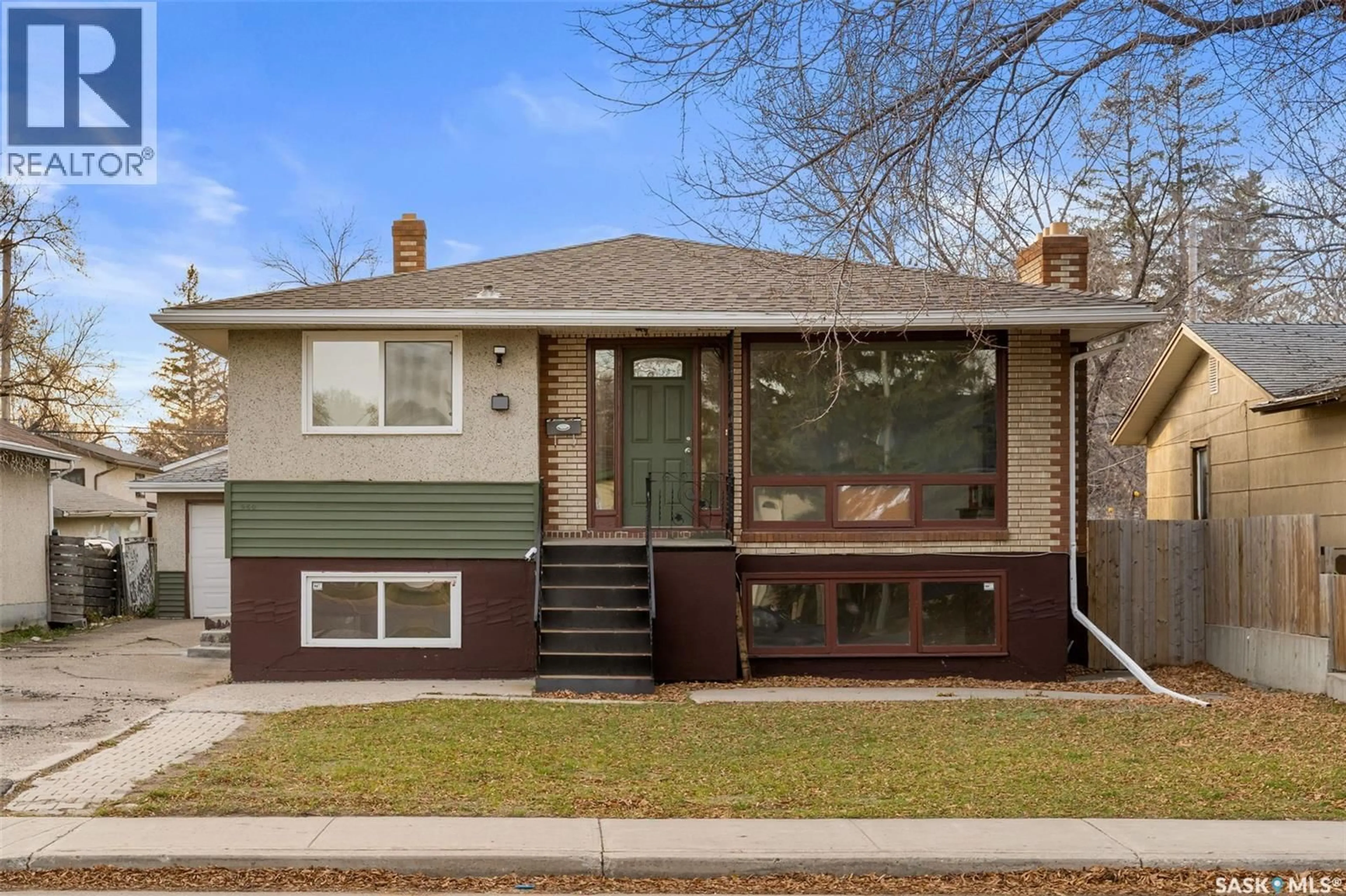 Home with brick exterior material, street for 960 ELPHINSTONE STREET, Regina Saskatchewan S4T3L6