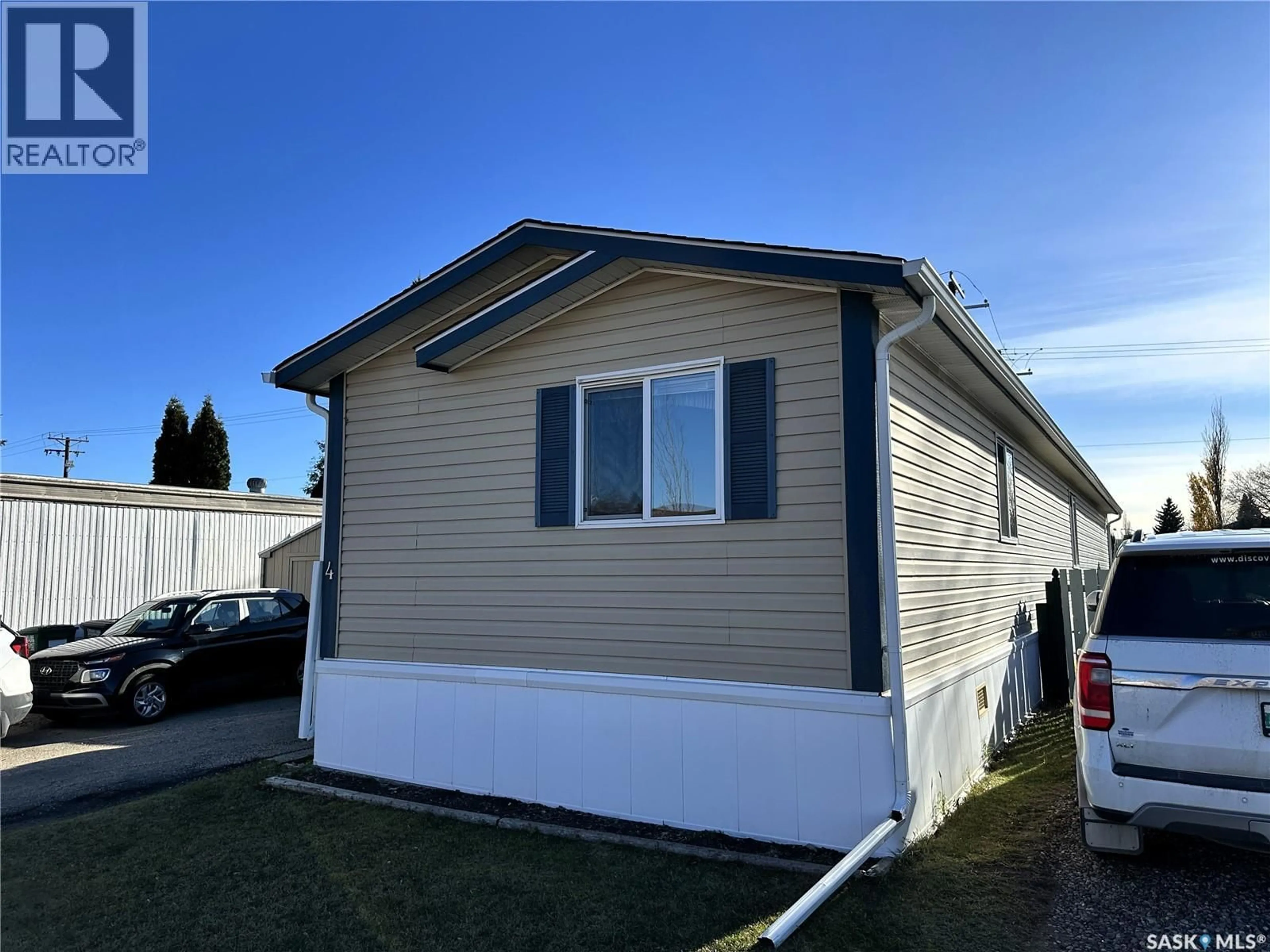 Home with vinyl exterior material, street for 4 1035 BOYCHUK DRIVE, Saskatoon Saskatchewan S7H5B2