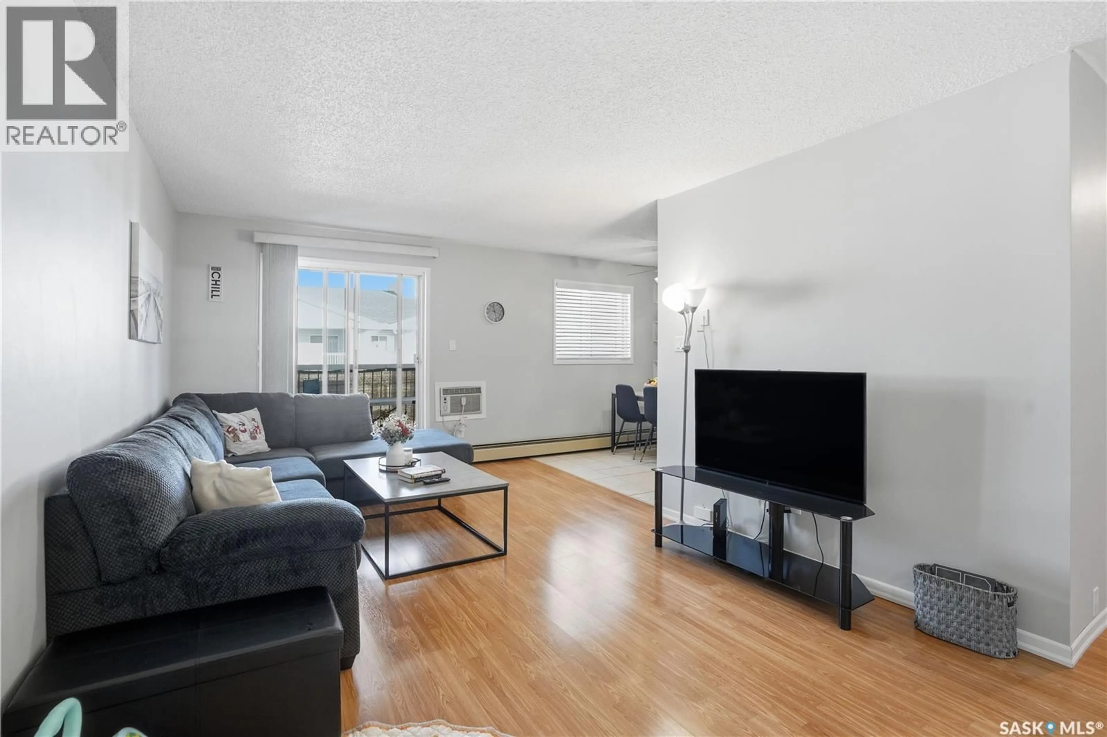 Living room with furniture, unknown for 309A - 301 CREE CRESCENT, Saskatoon Saskatchewan S7K7Y3