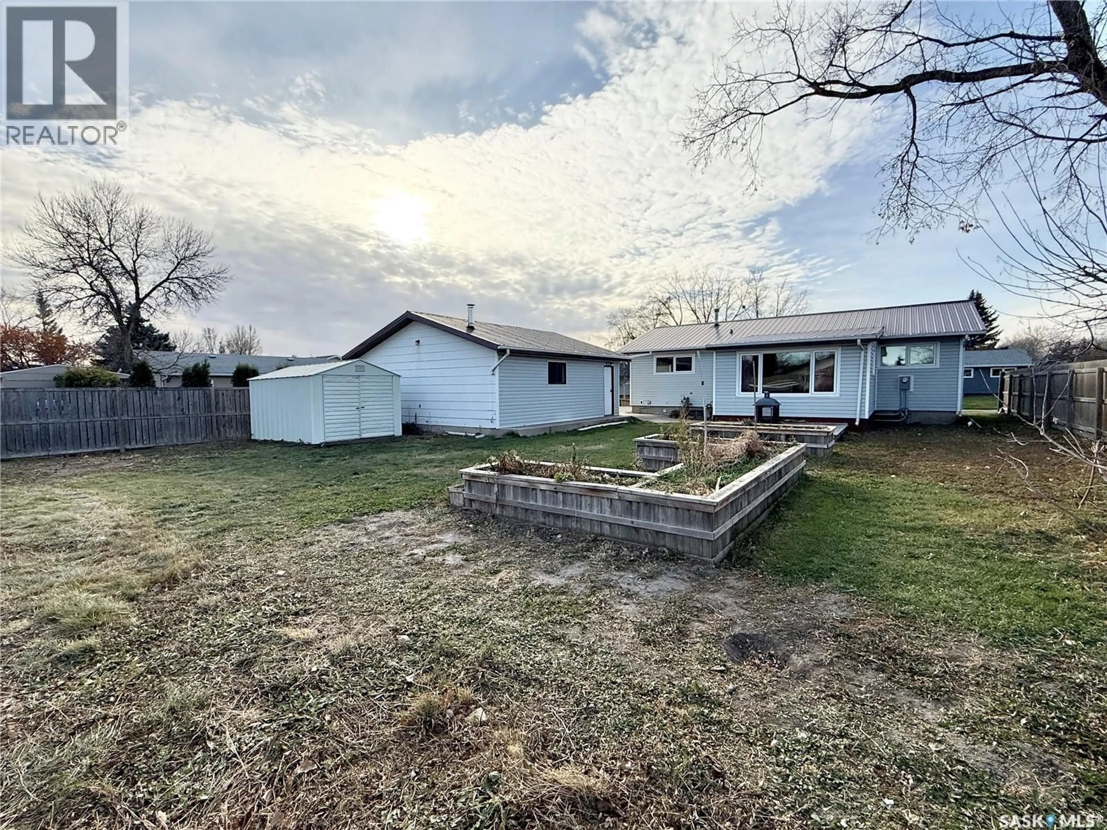 A pic from outside/outdoor area/front of a property/back of a property/a pic from drone, street for 216 ONSTAD CRESCENT, Weyburn Saskatchewan S4H2T2
